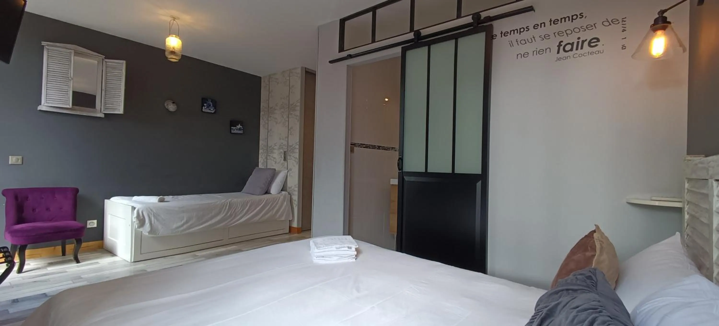 Bed in Hôtel Le P'tit Monde