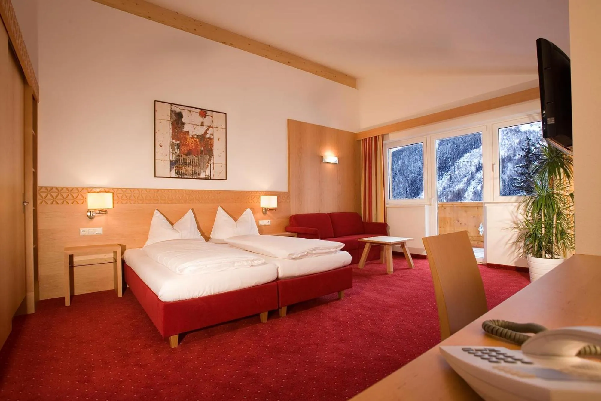 Photo of the whole room, Bed in Hotel Karl Schranz