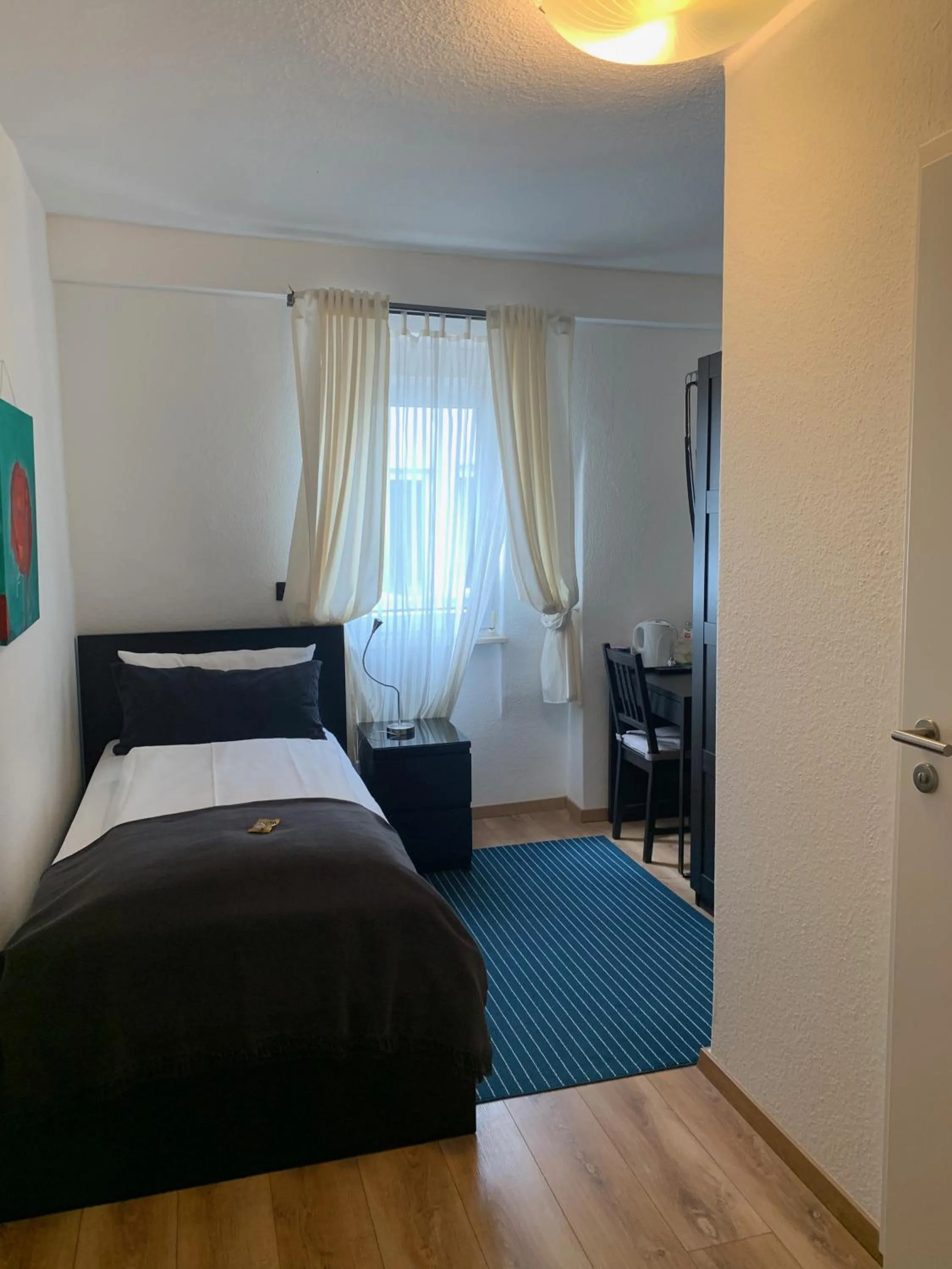 Bed in Apart Hotel Paradies