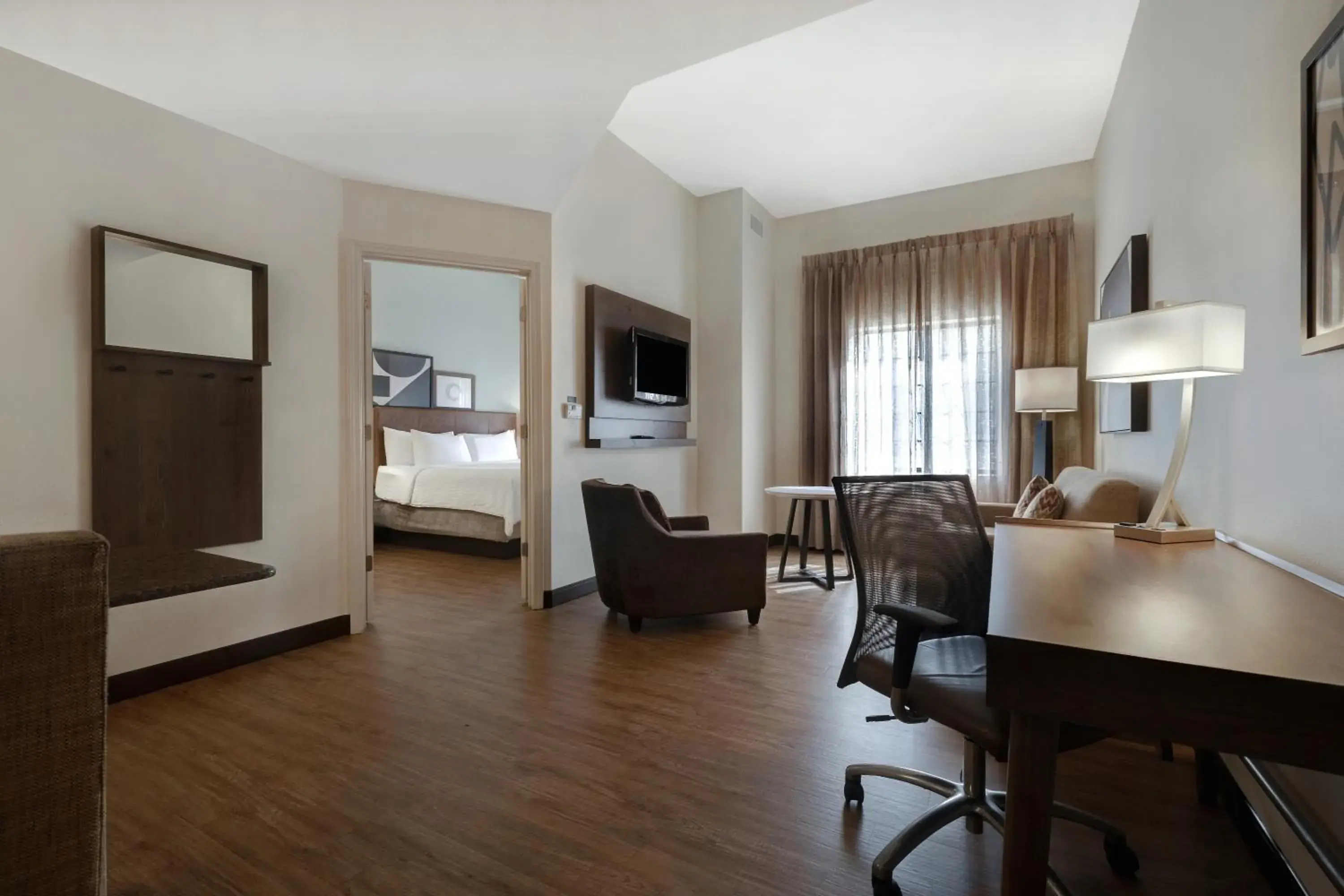 Living room, Bed in Staybridge Suites Tallahassee I-10 East by IHG Living room, Bed in Staybridge Suites Tallahassee I-10 East by IHG