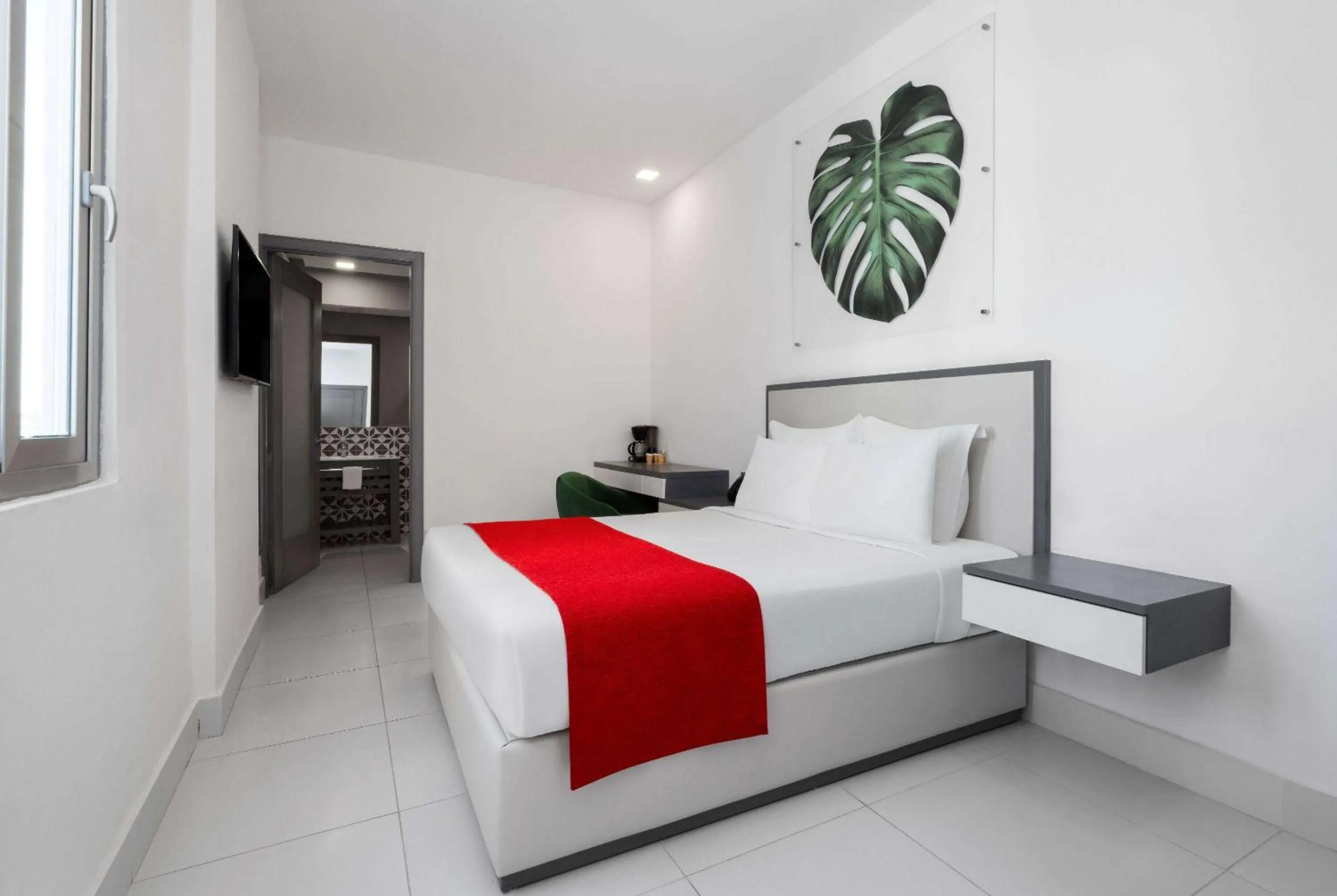 Photo of the whole room, Bed in Gran Hotel Europa Santo Domingo Trademark Collection by Wyndham