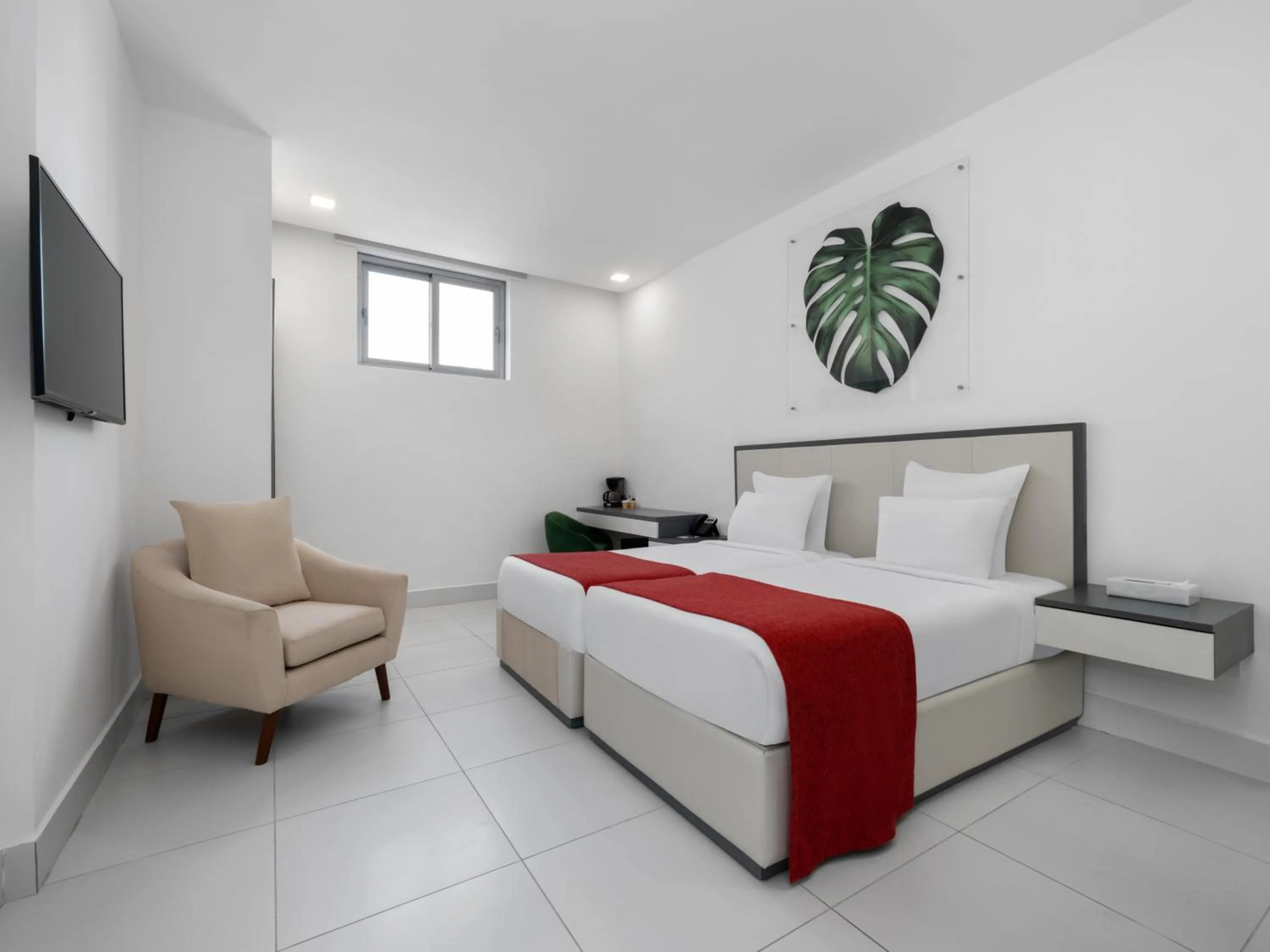 Seating area, Bed in Gran Hotel Europa Santo Domingo Trademark Collection by Wyndham