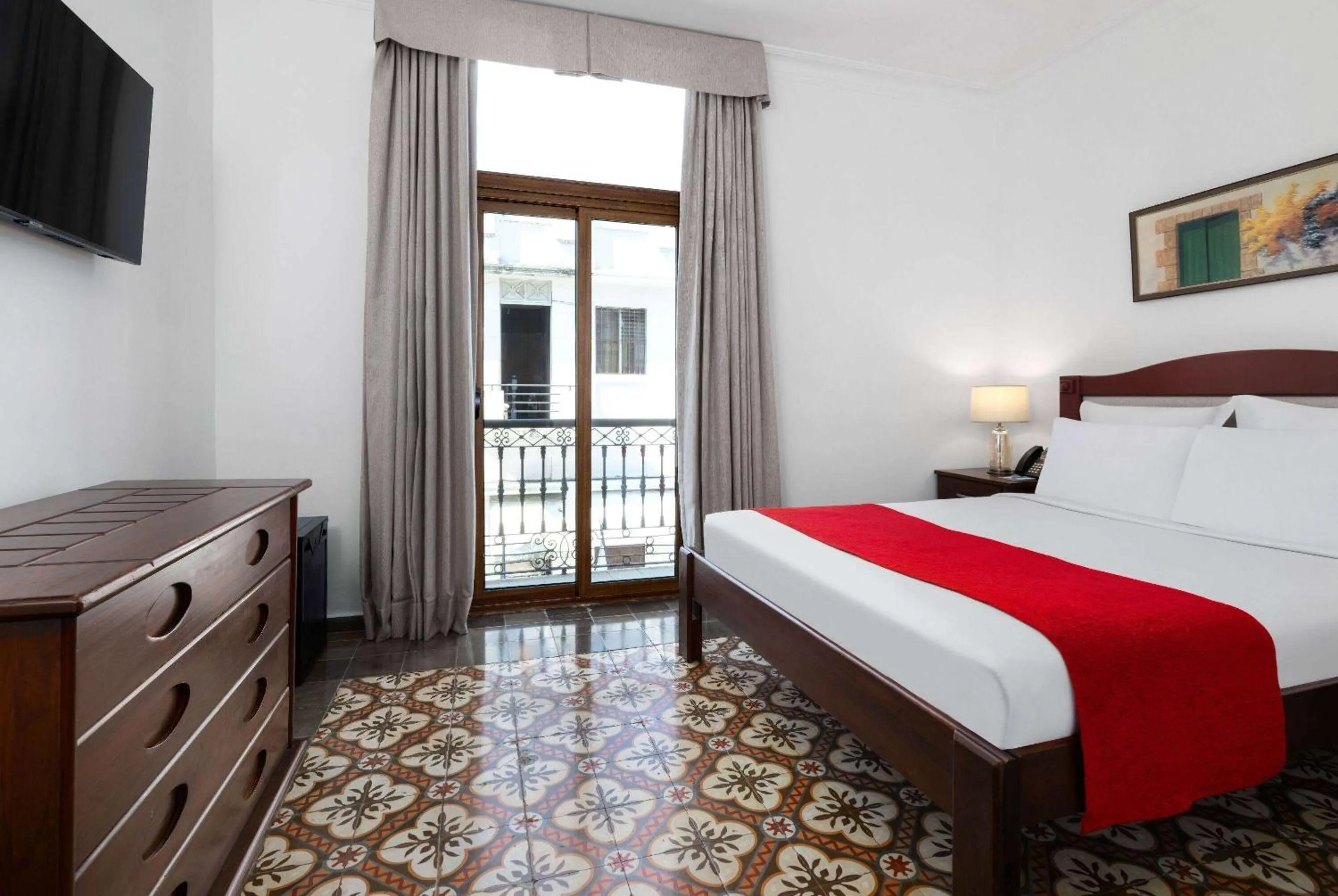 Photo of the whole room, Bed in Gran Hotel Europa Santo Domingo Trademark Collection by Wyndham