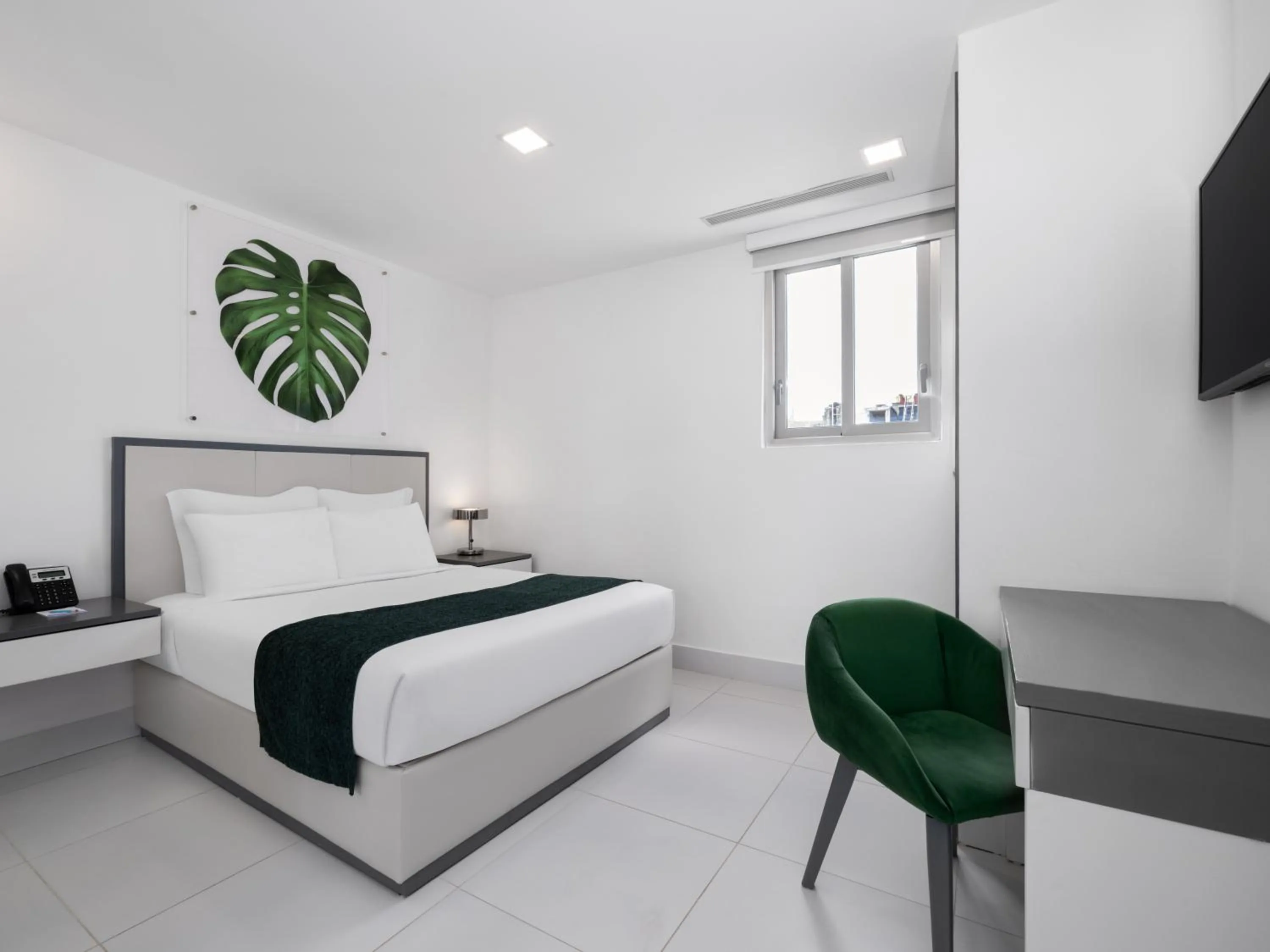 Bed in Gran Hotel Europa Santo Domingo Trademark Collection by Wyndham