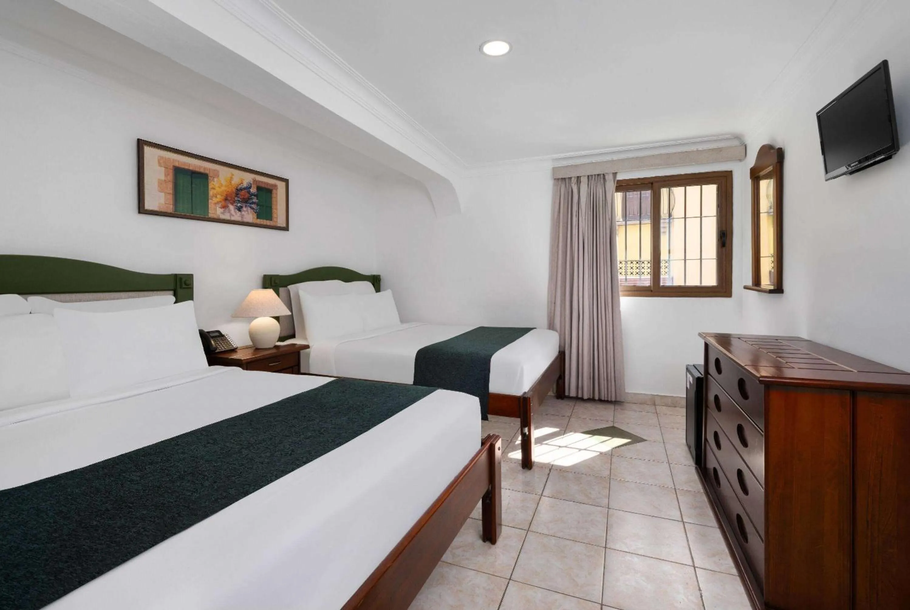 Photo of the whole room, Bed in Gran Hotel Europa Santo Domingo Trademark Collection by Wyndham