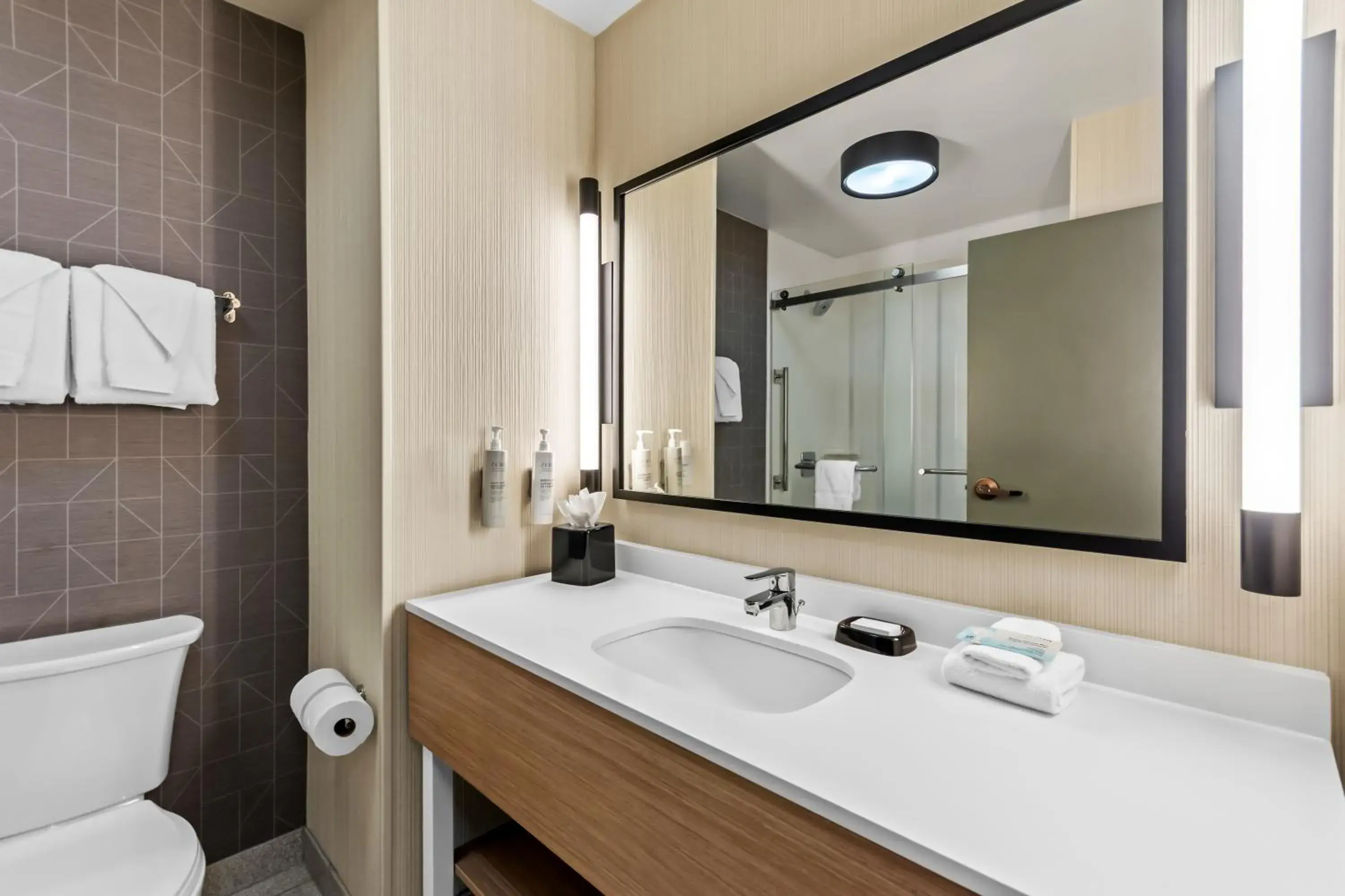 Bathroom in Spark by Hilton Bardstown Bathroom in Spark by Hilton Bardstown