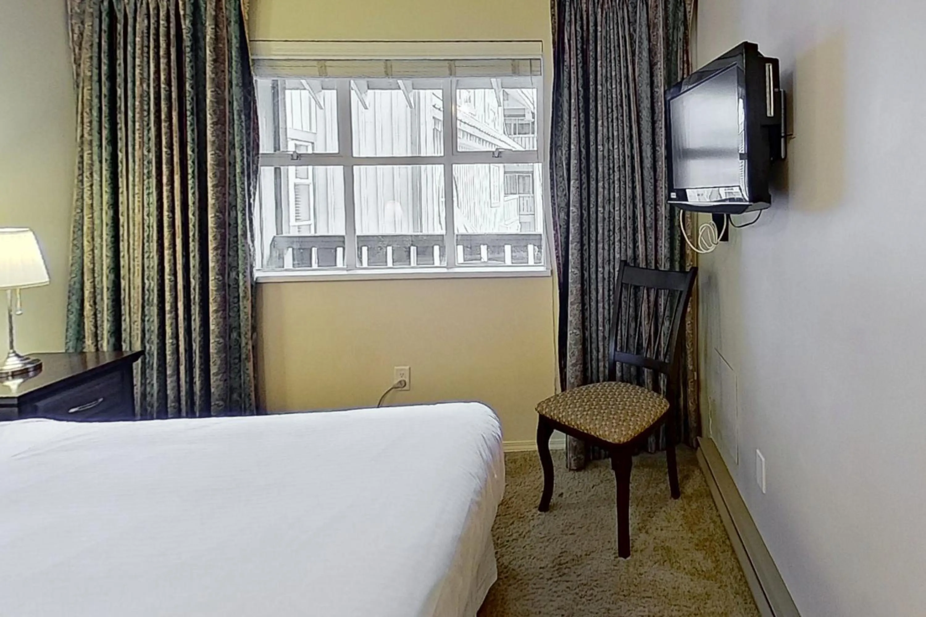 Bed in Glacier Lodge