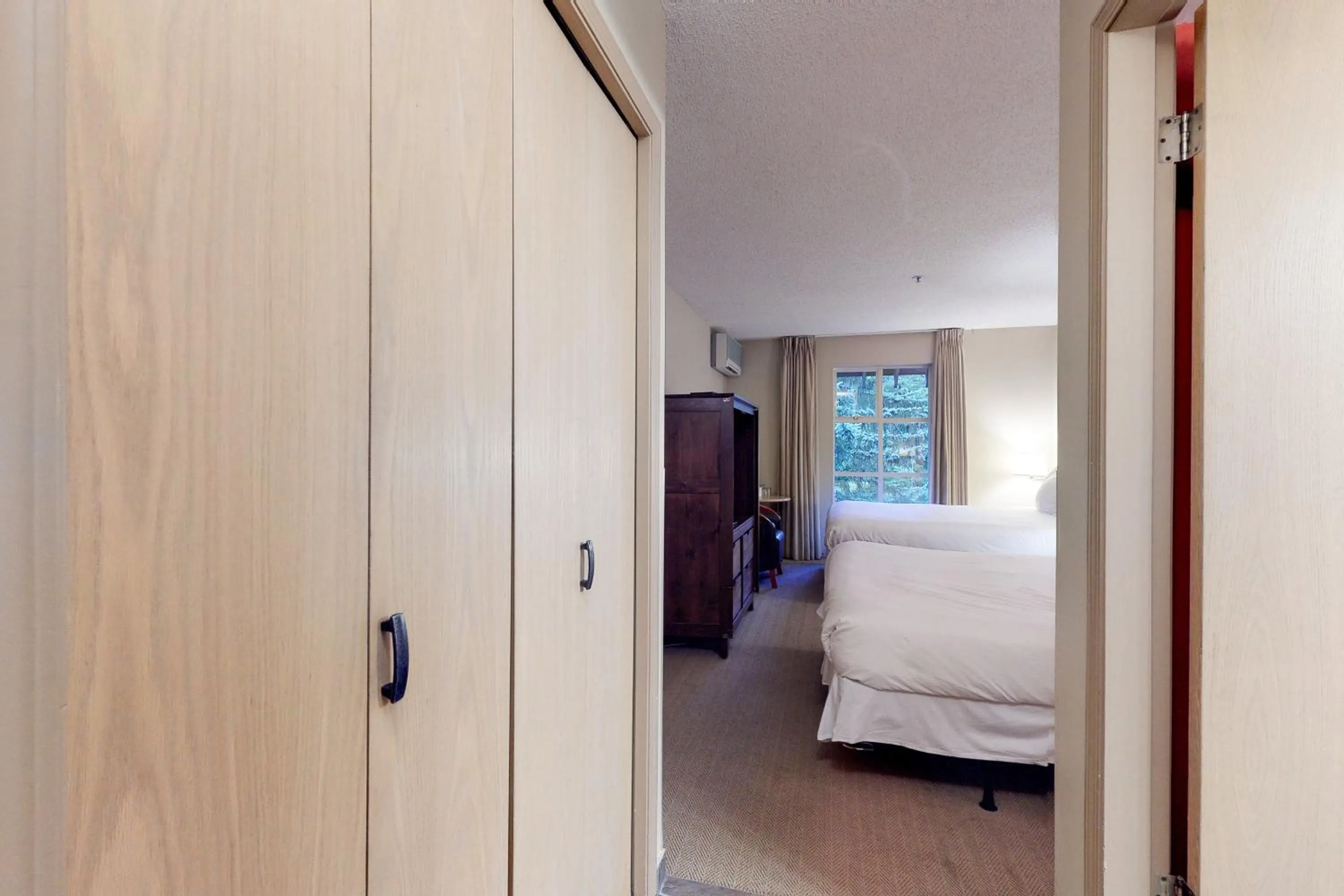Bed in Glacier Lodge