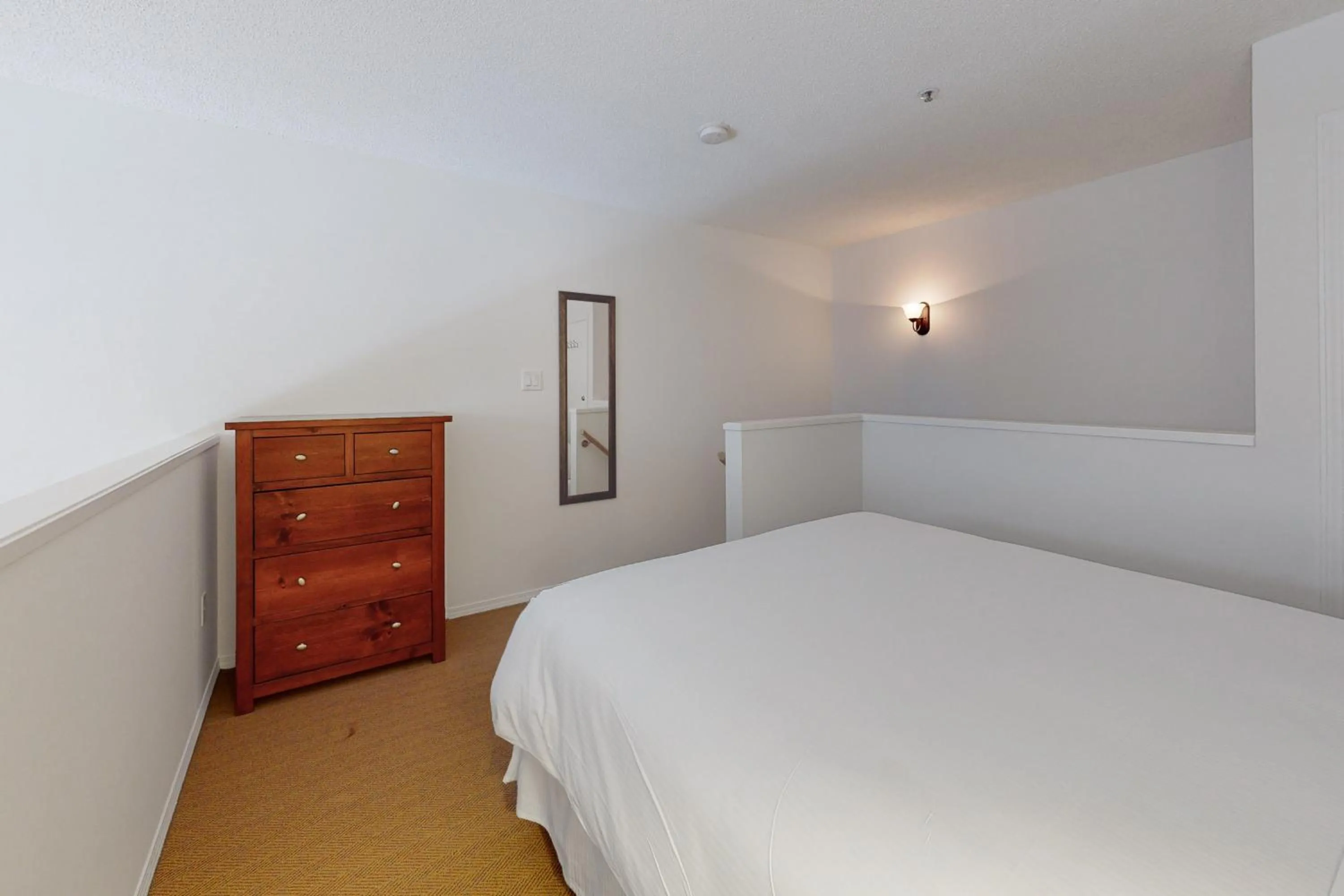 Bed in Glacier Lodge