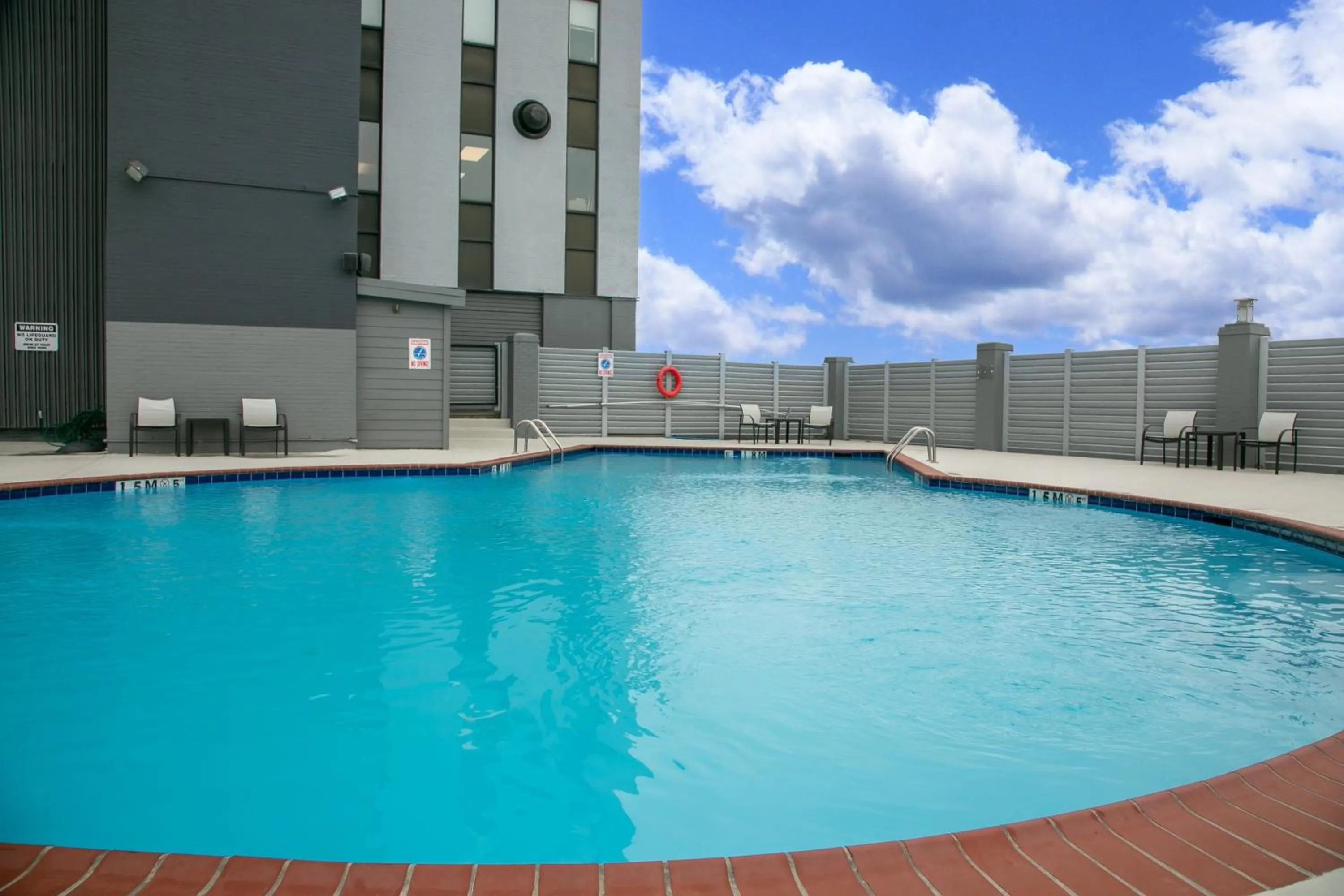 Swimming pool in Holiday Inn Metairie New Orleans by IHG