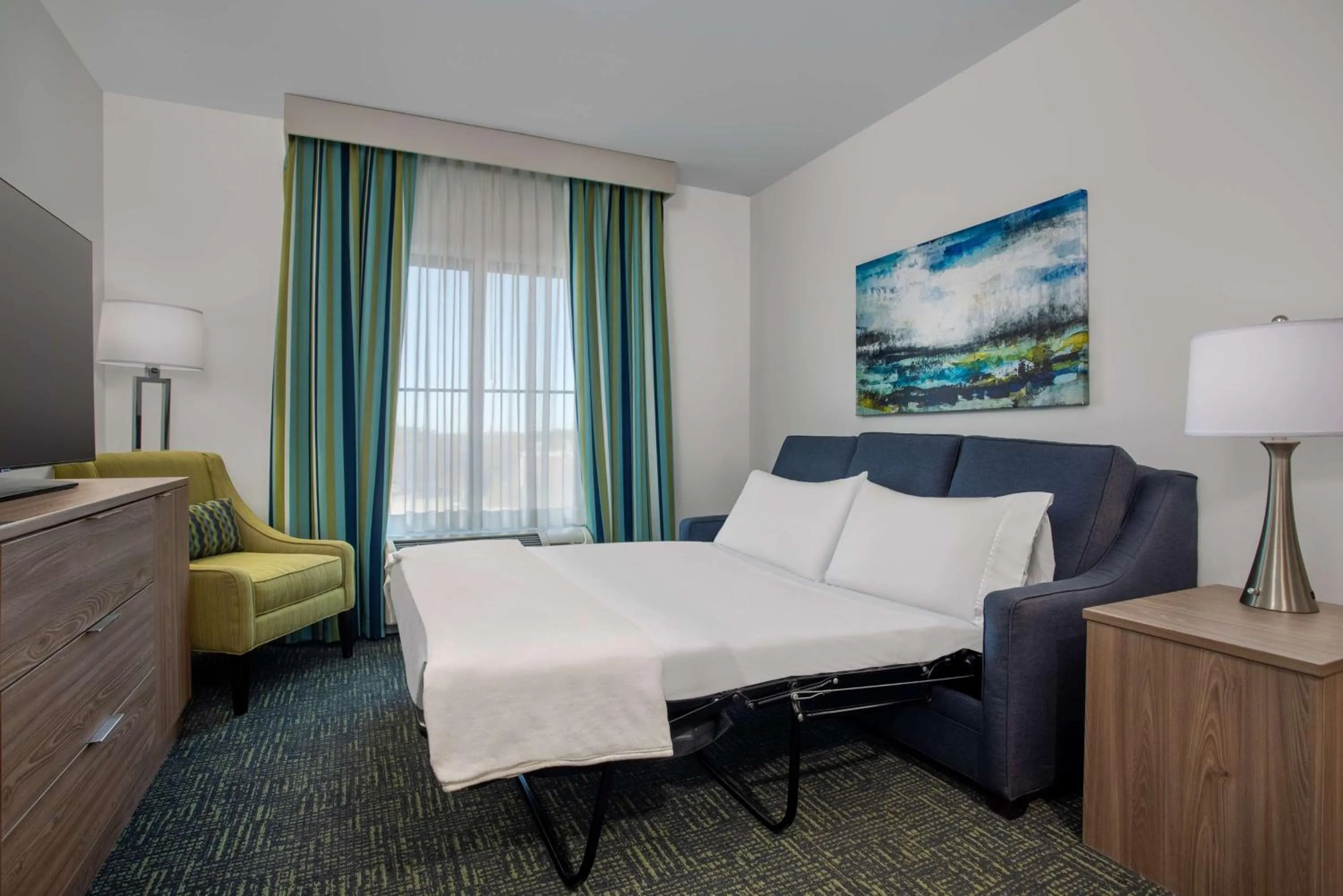 Living room, Bed in Homewood Suites by Hilton Davidson