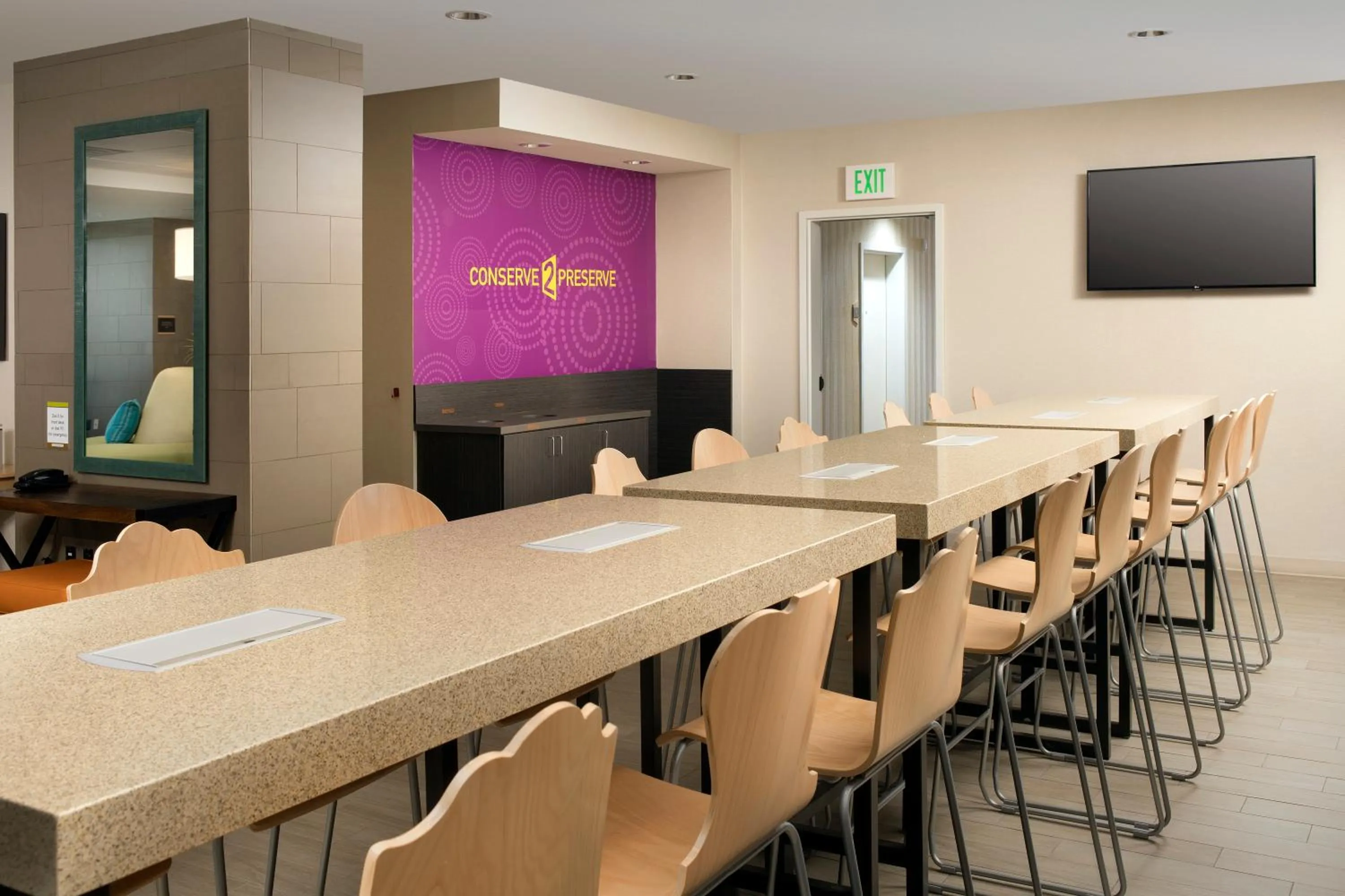 Seating area in Home2 Suites by Hilton Denver International Airport