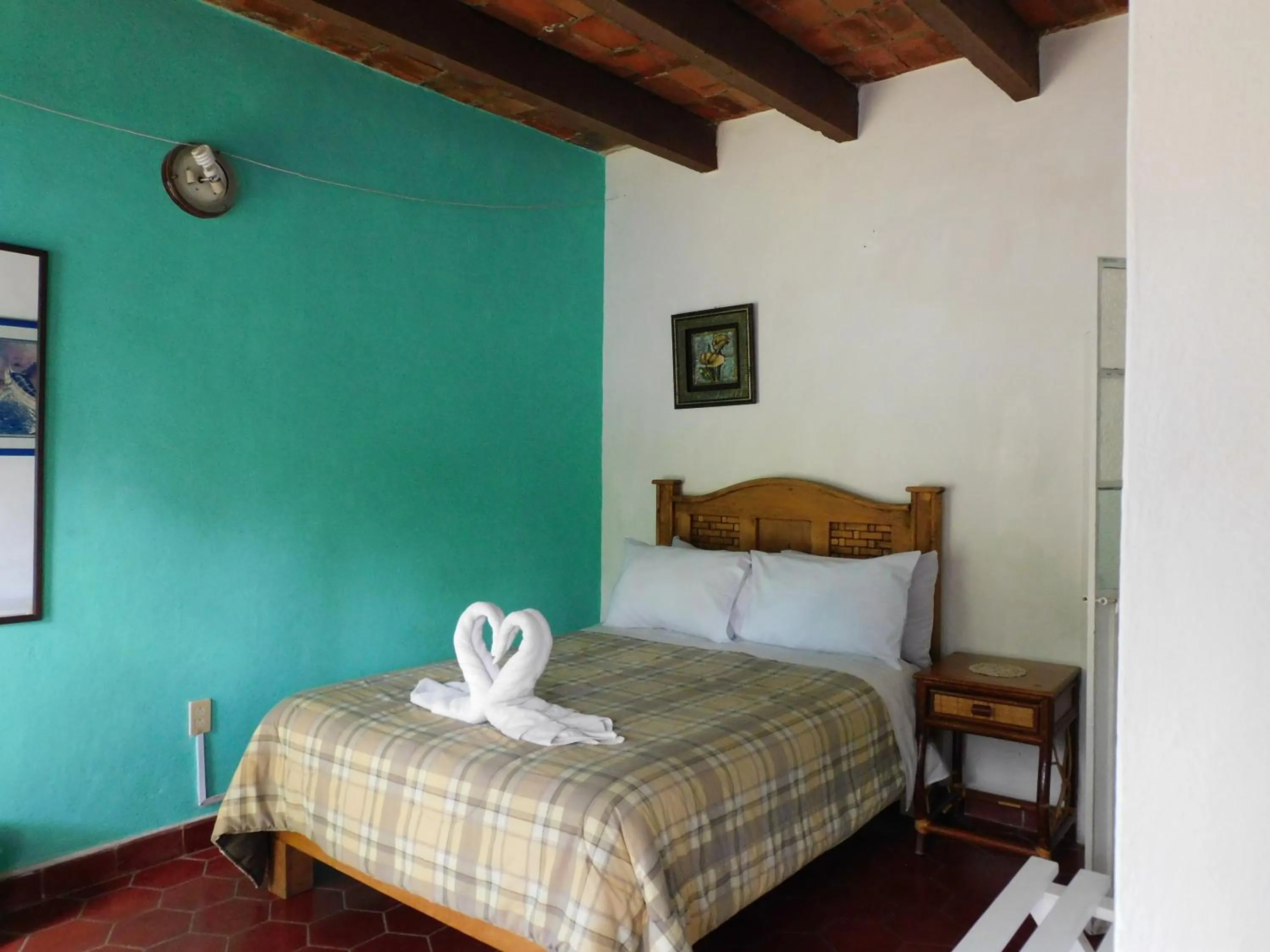 Bed in Hotel Elohim by Rotamundos