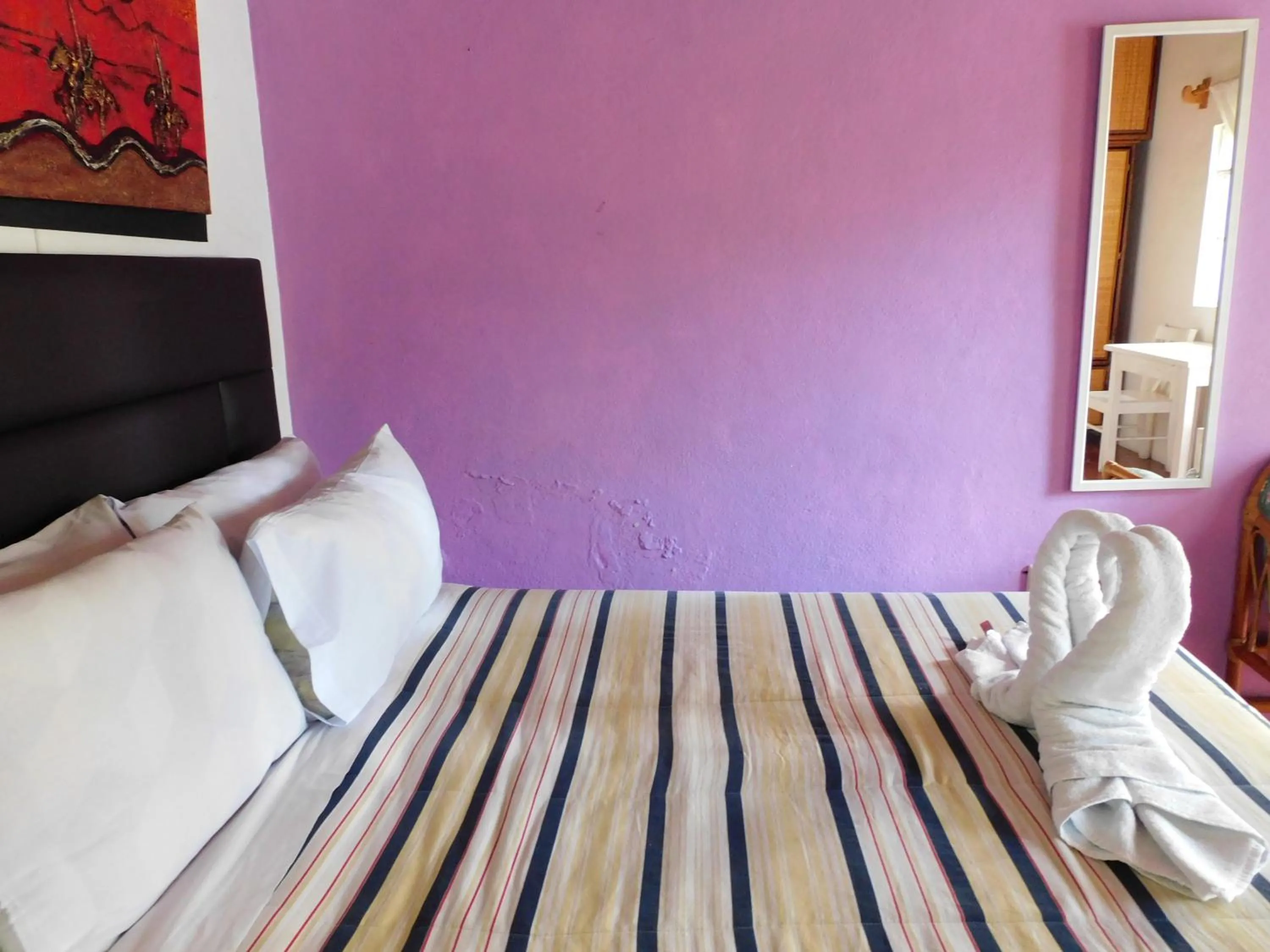 Bed in Hotel Elohim by Rotamundos