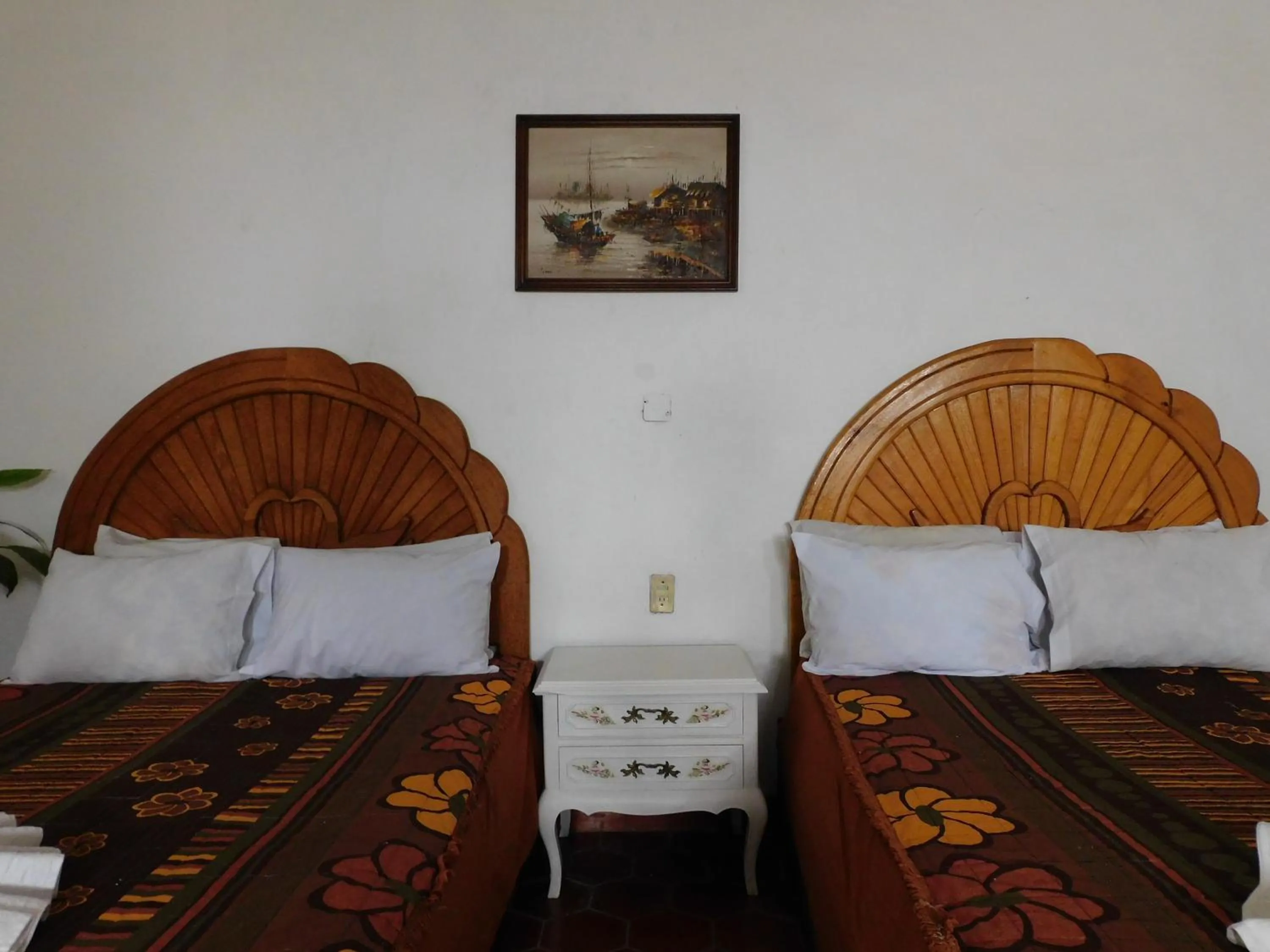 Bed in Hotel Elohim by Rotamundos