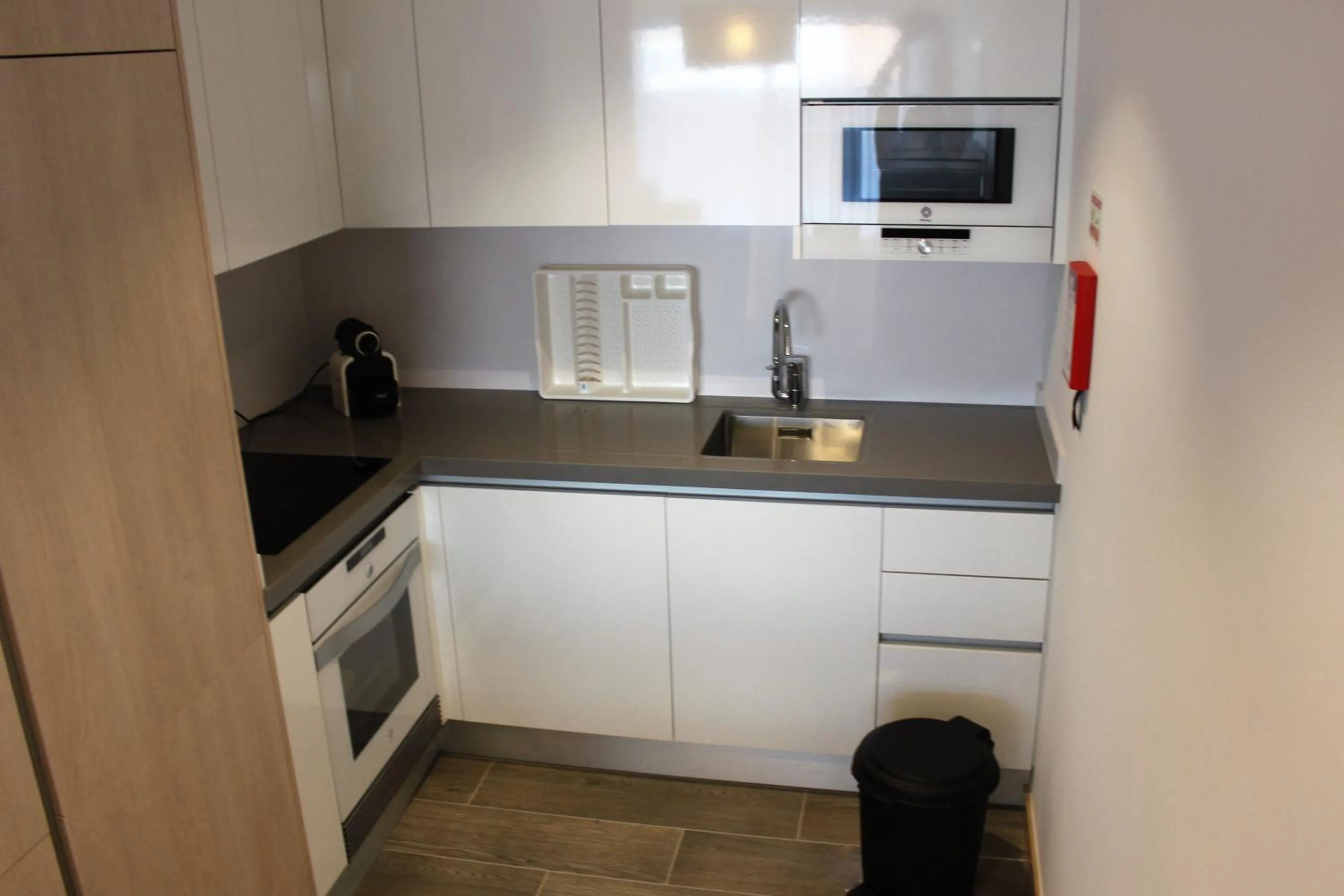 Kitchen or kitchenette in Apartamentos Turisticos da Nazare