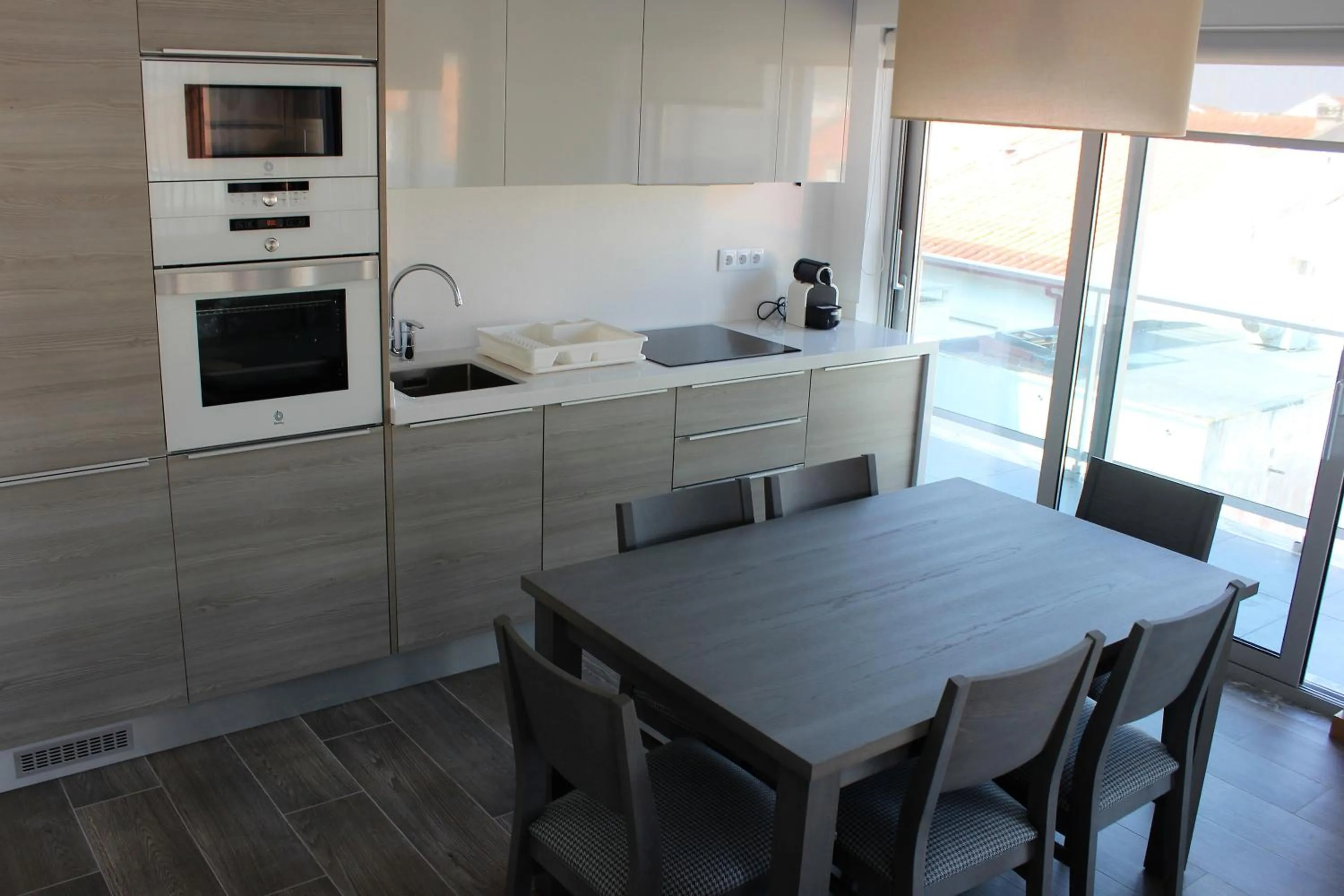 Kitchen or kitchenette in Apartamentos Turisticos da Nazare