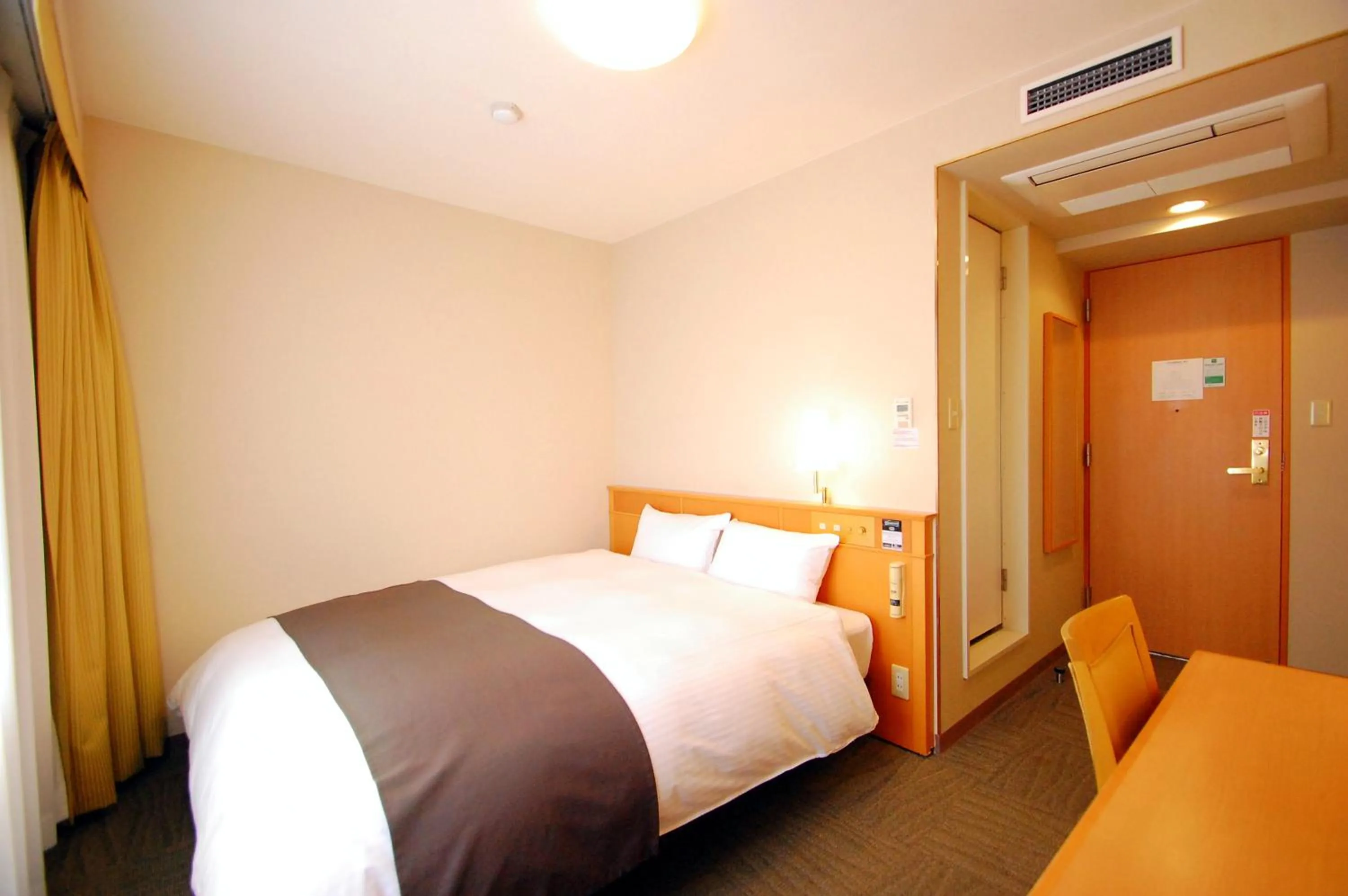 Bed in Izumo Royal Hotel