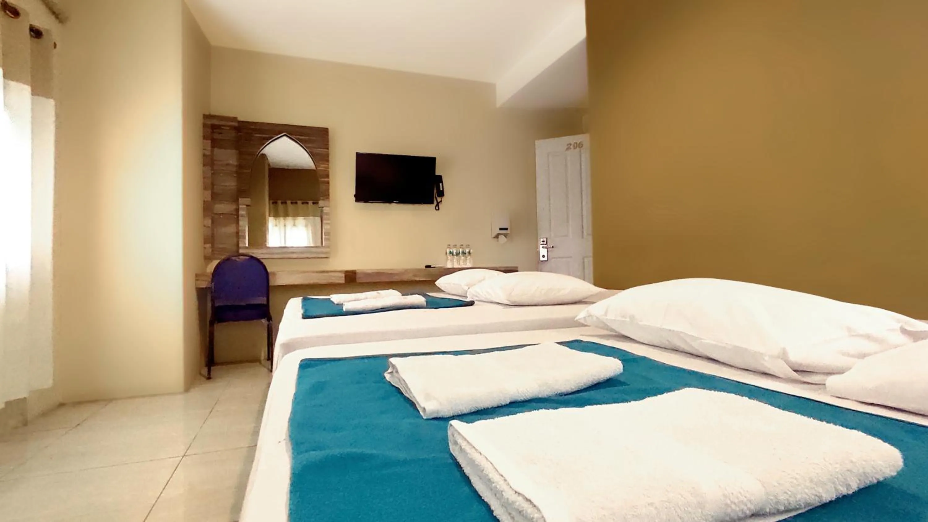 Bed in Hotel Syariah Larismanis