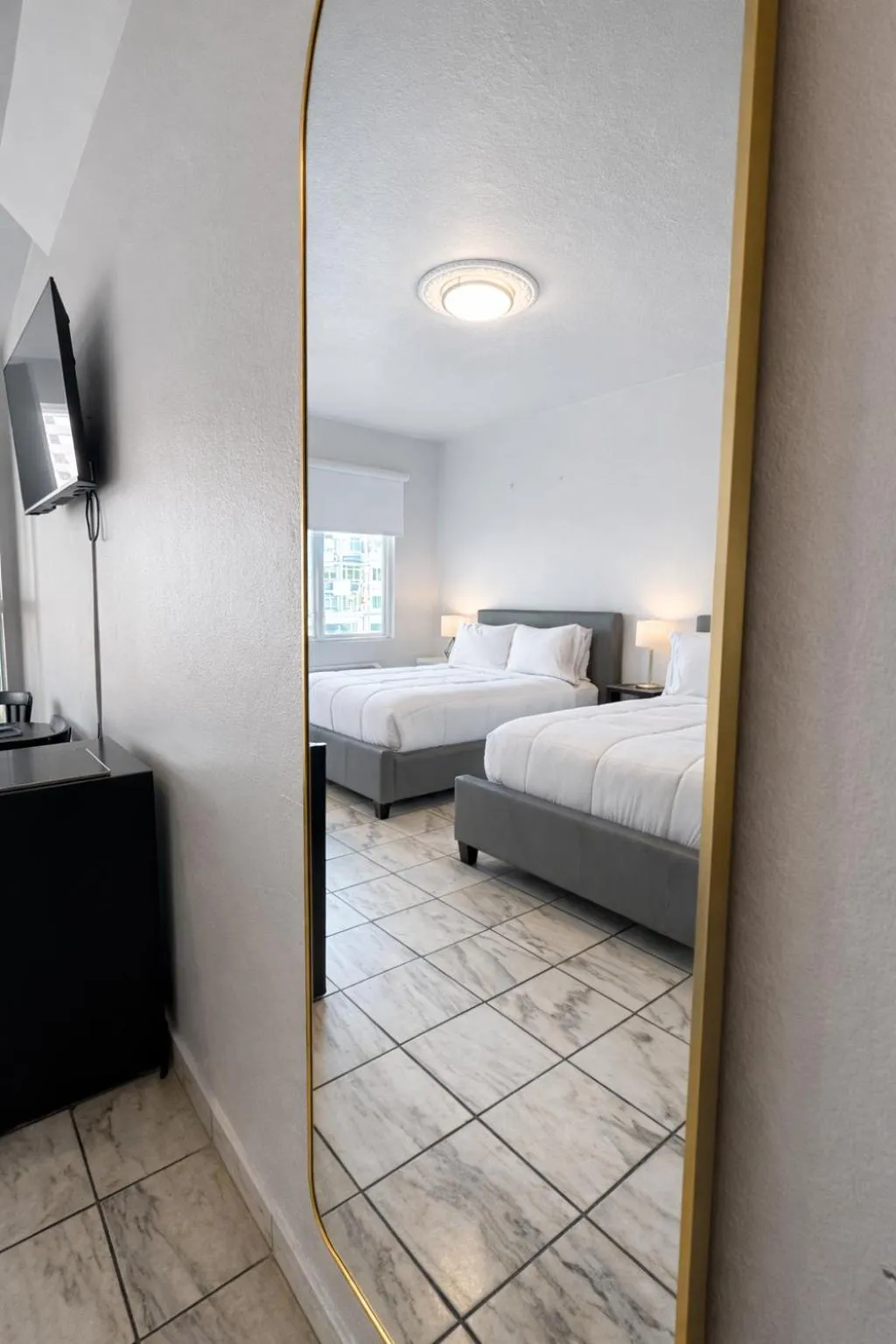 Bed in Coral Princess Hotel