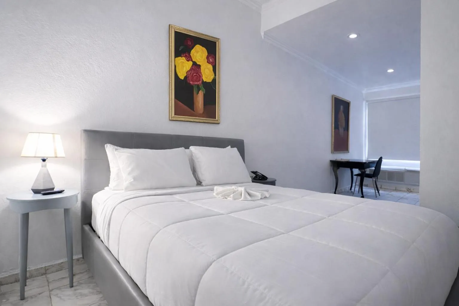 Bed in Coral Princess Hotel