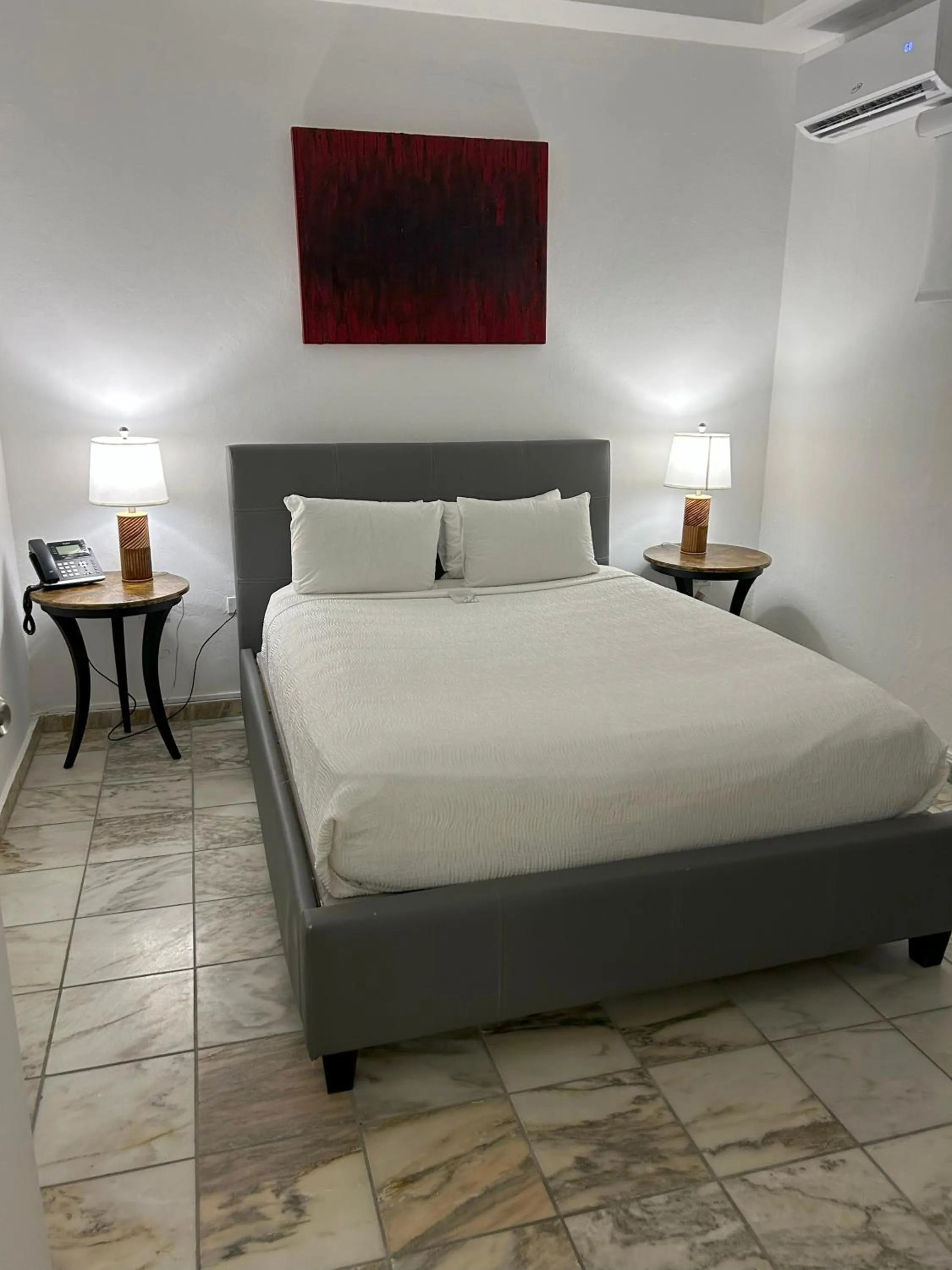 Bed in Coral Princess Hotel