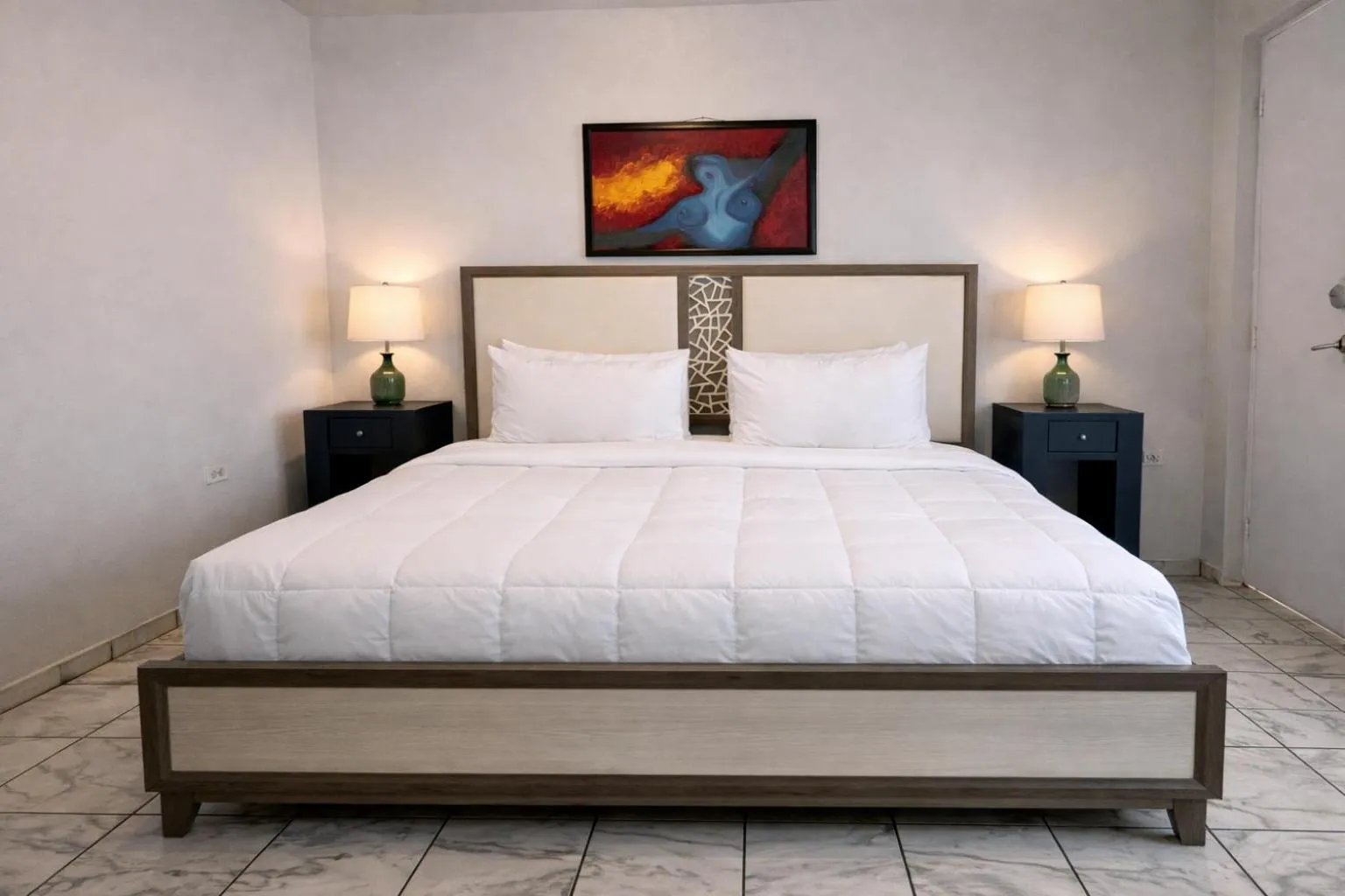 Bed in Coral Princess Hotel