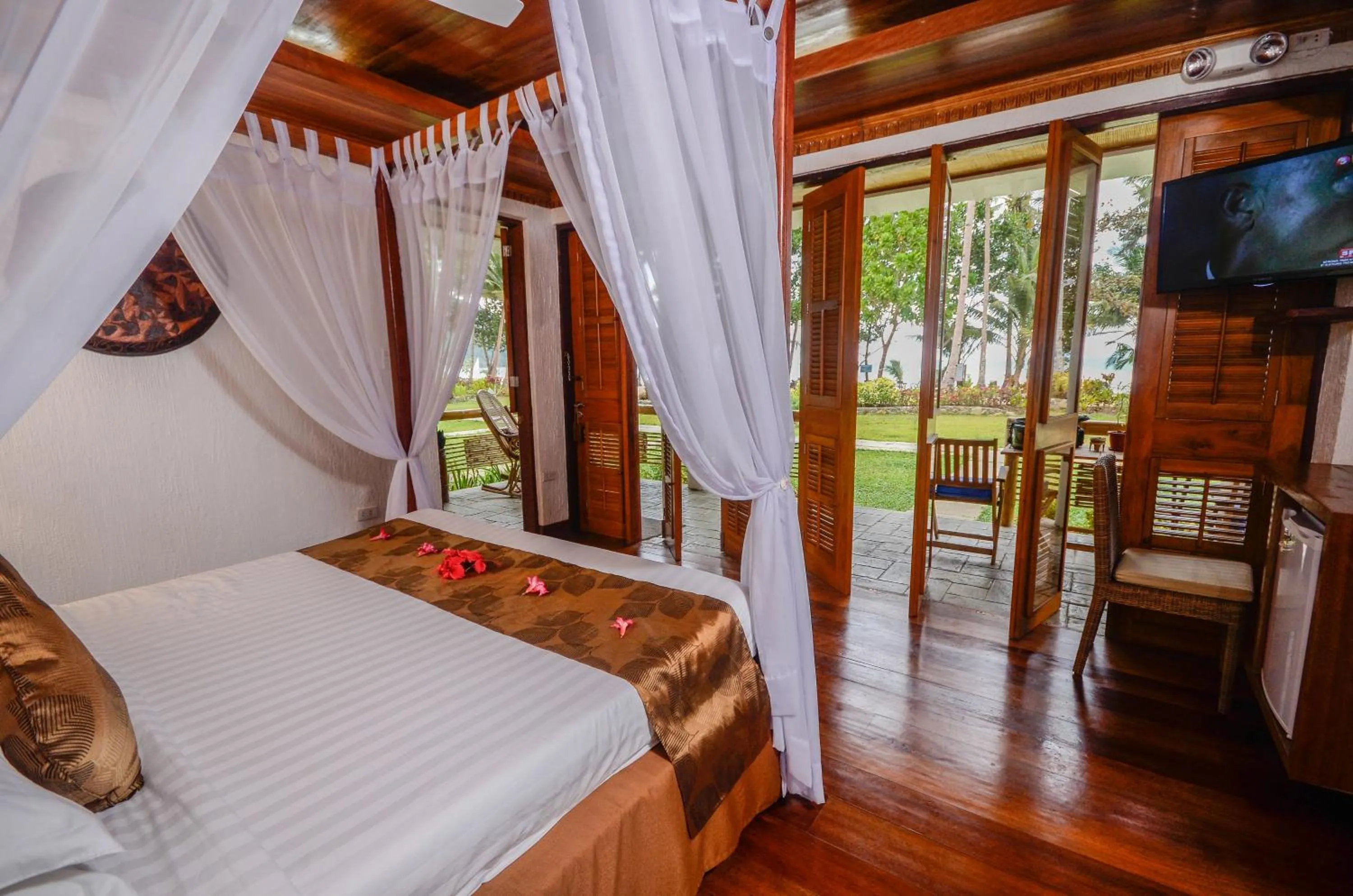 Photo of the whole room, Bed in Daluyon Beach and Mountain Resort