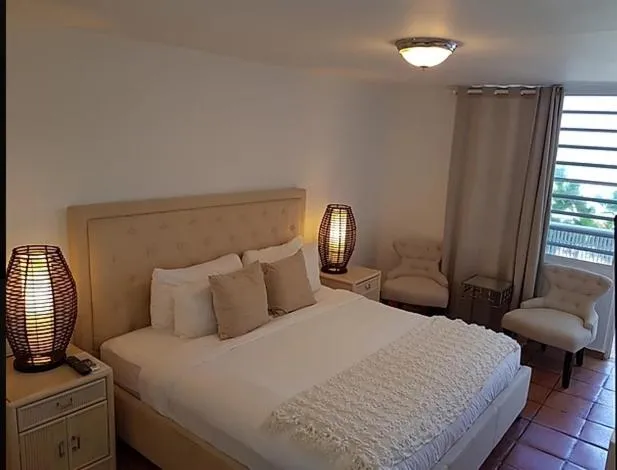 Seating area, Bed in Hosteria del Mar