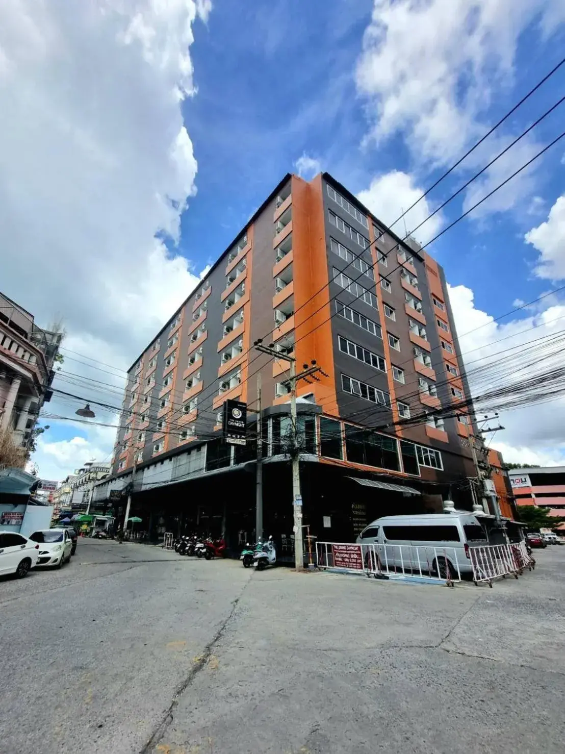 Property building in The Grand Day Night Property building in The Grand Day Night