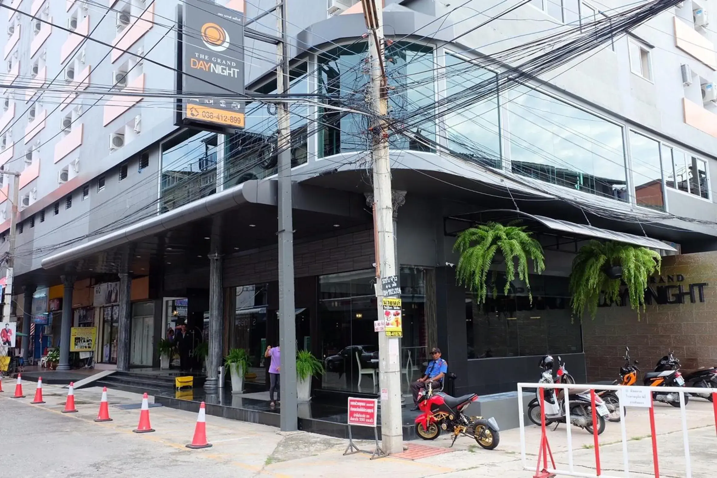 Property building in The Grand Day Night Property building in The Grand Day Night