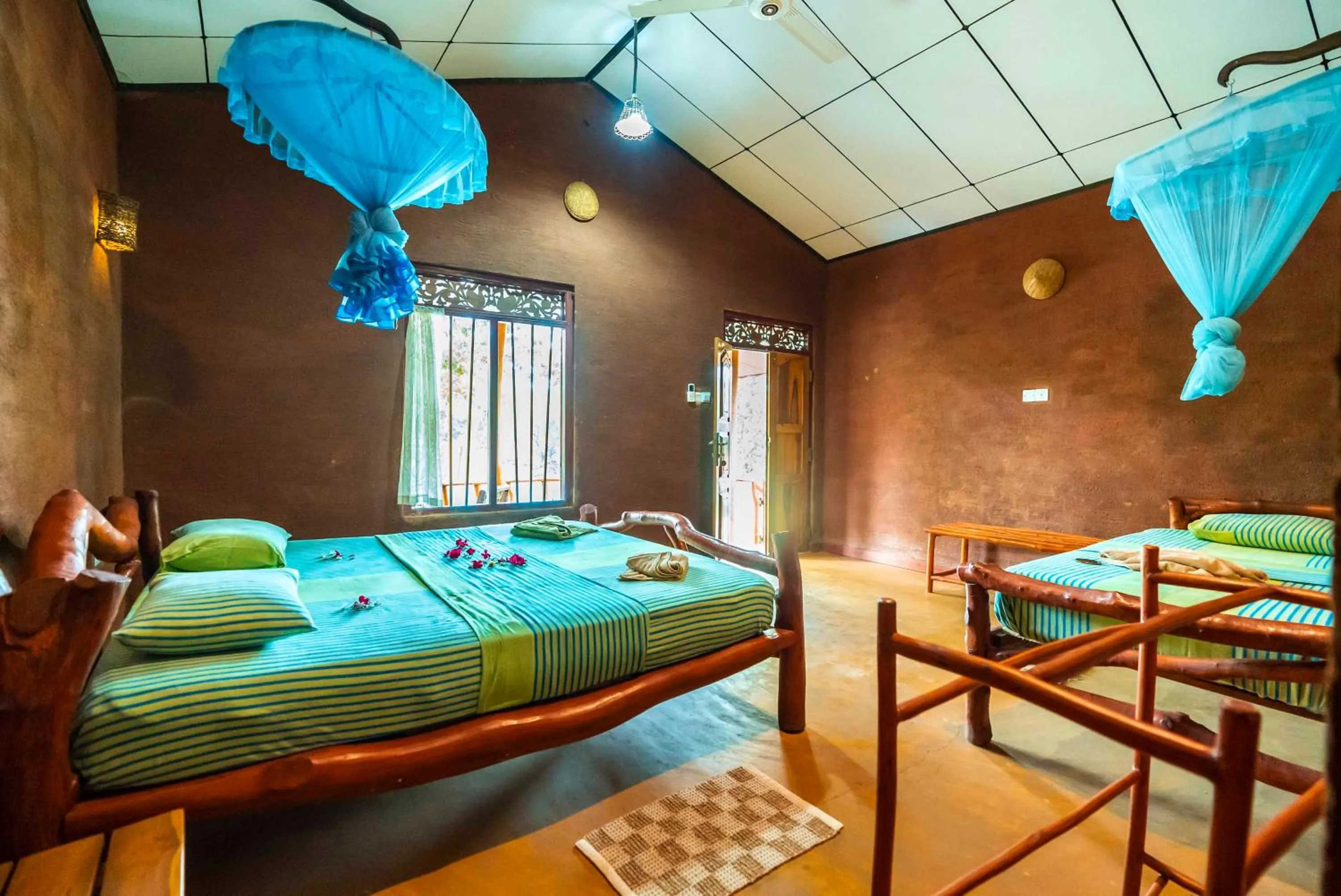 Bed in Yala Peace Cottages