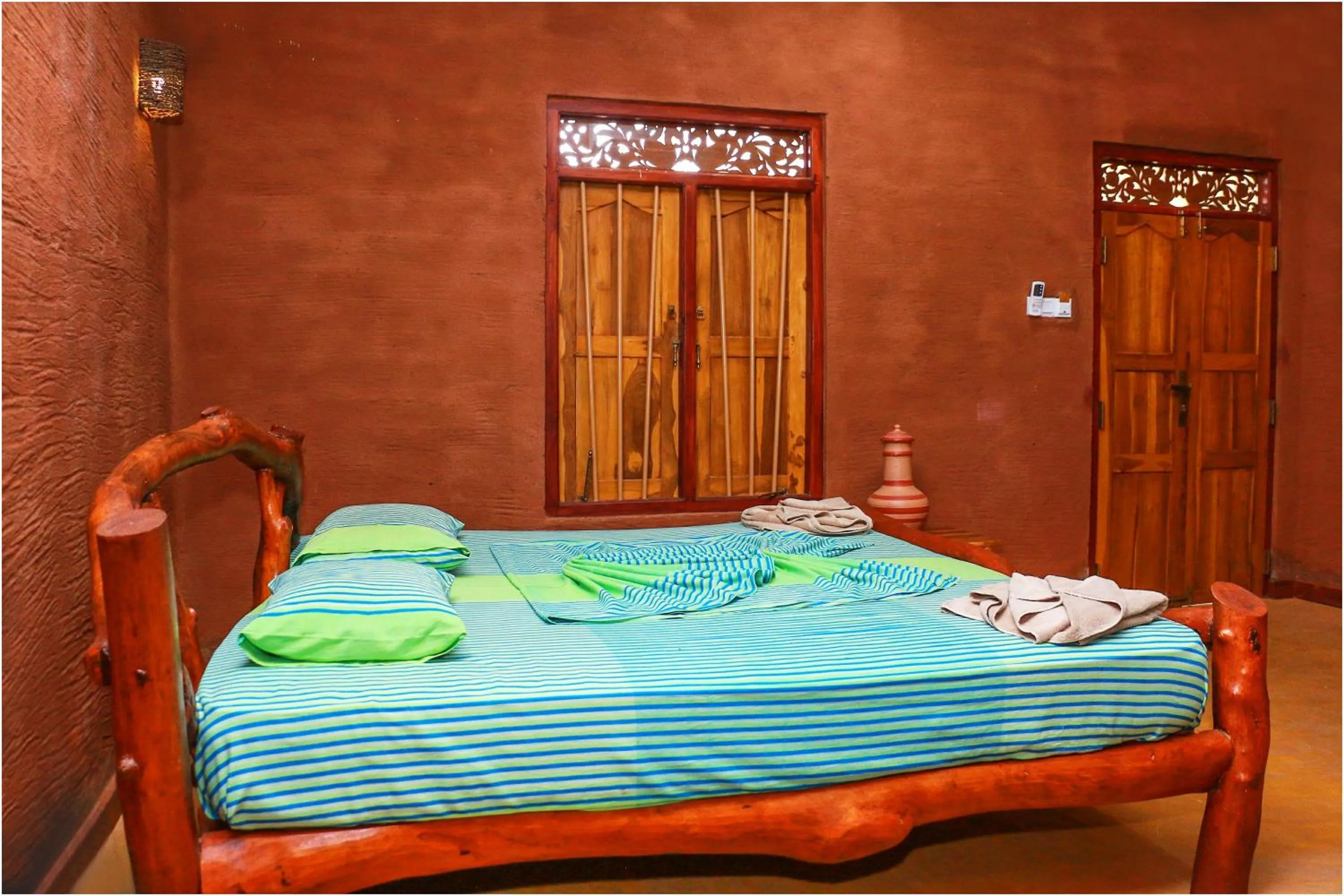 Bed in Yala Peace Cottages