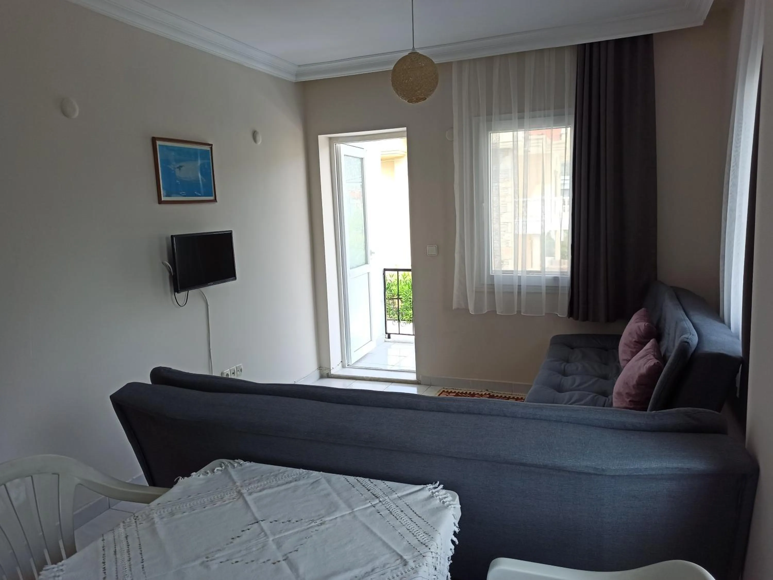 Communal lounge/ TV room in Işıl Suit Apart Otel