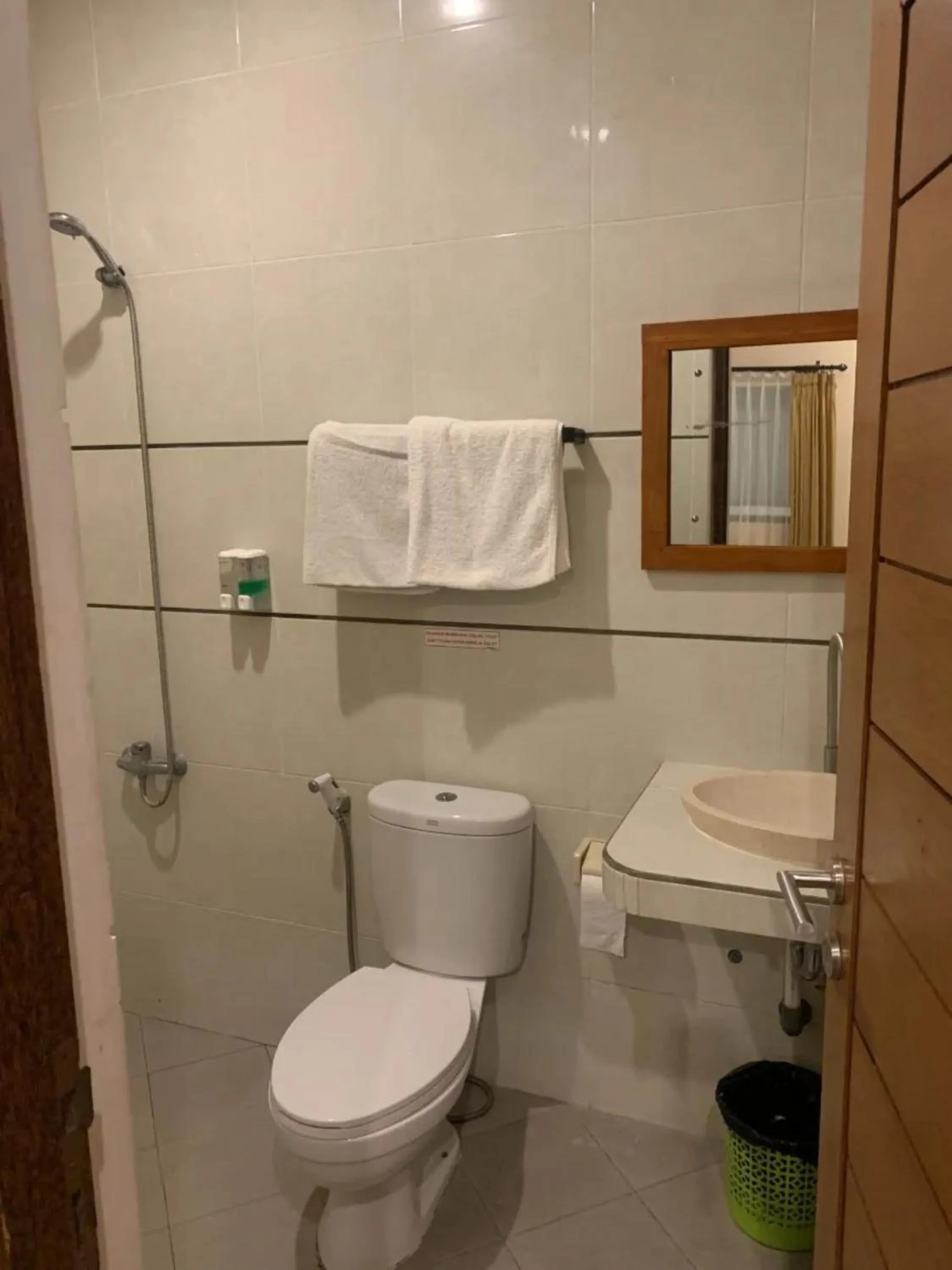 Bathroom in Kuta Suci Guesthouse