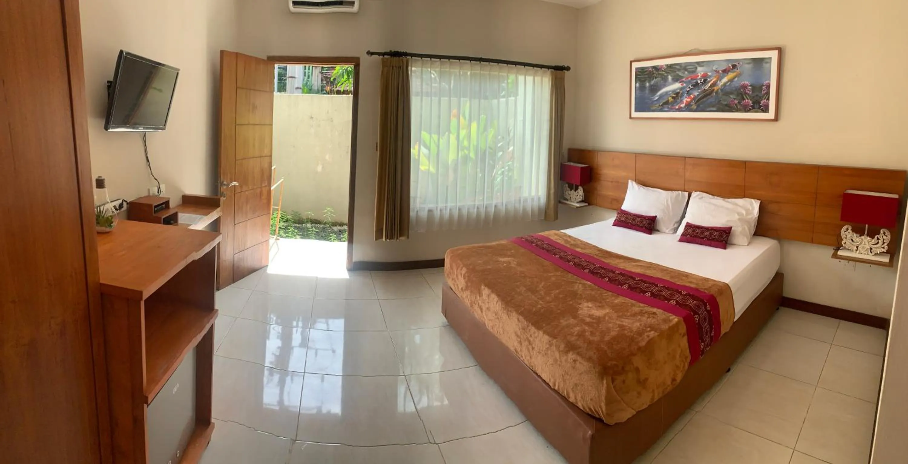 Bed in Kuta Suci Guesthouse