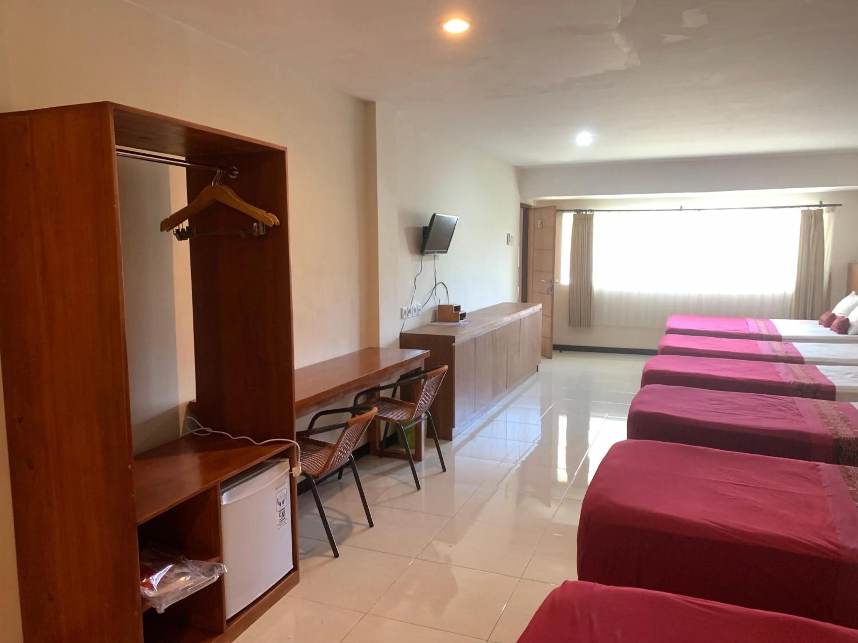 Bed in Kuta Suci Guesthouse