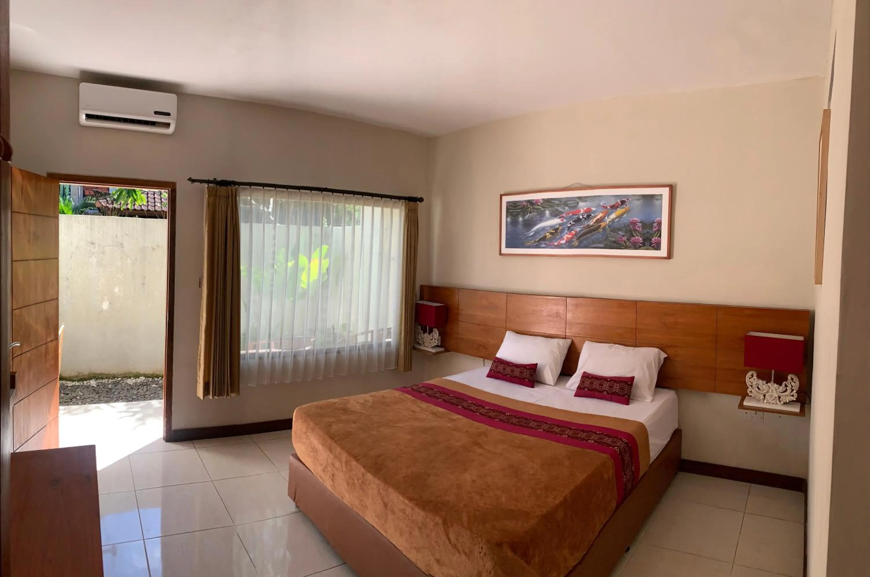 Bed in Kuta Suci Guesthouse