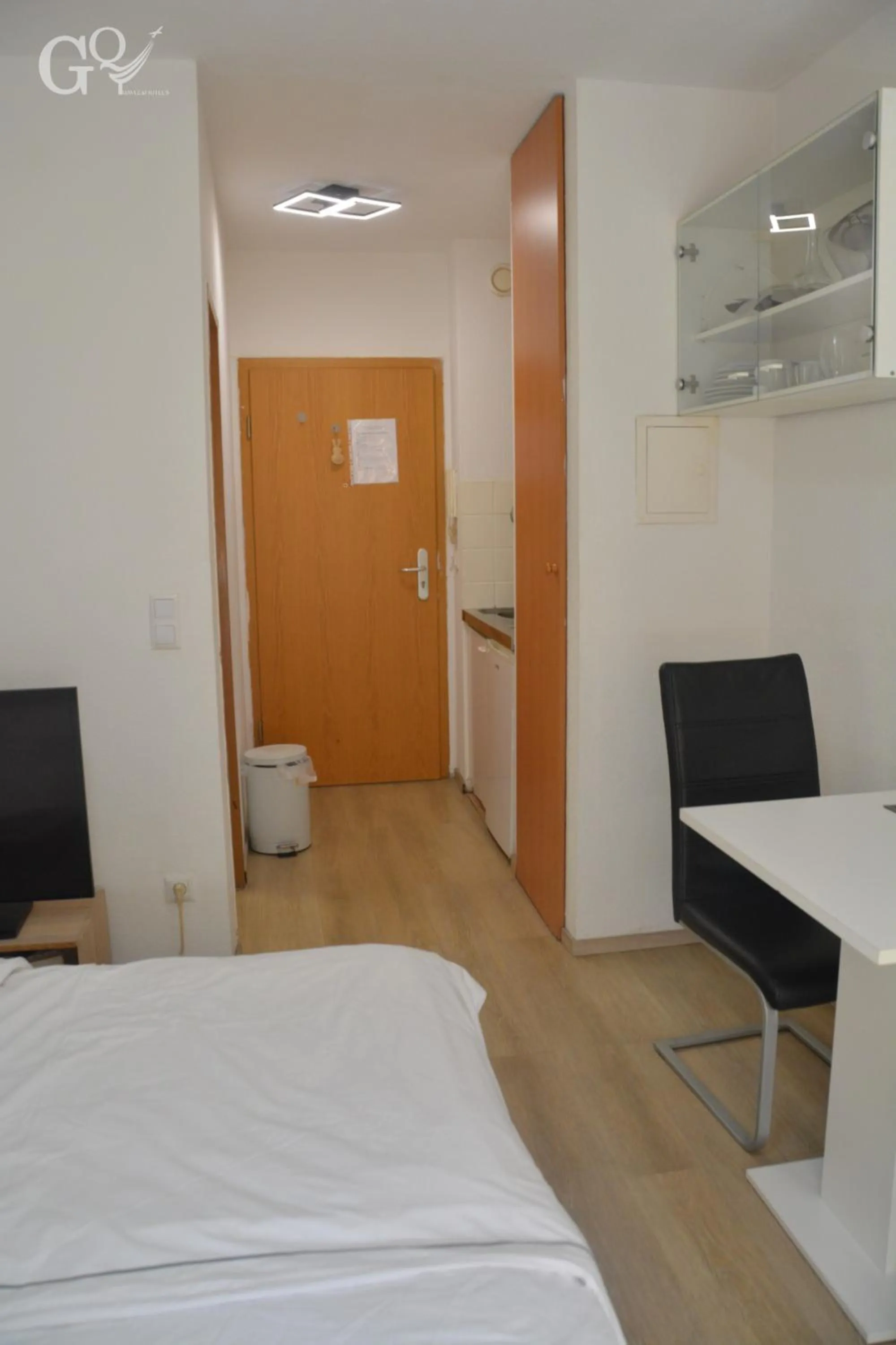 Kitchen or kitchenette, Bed in Saarbrücken City Apartments