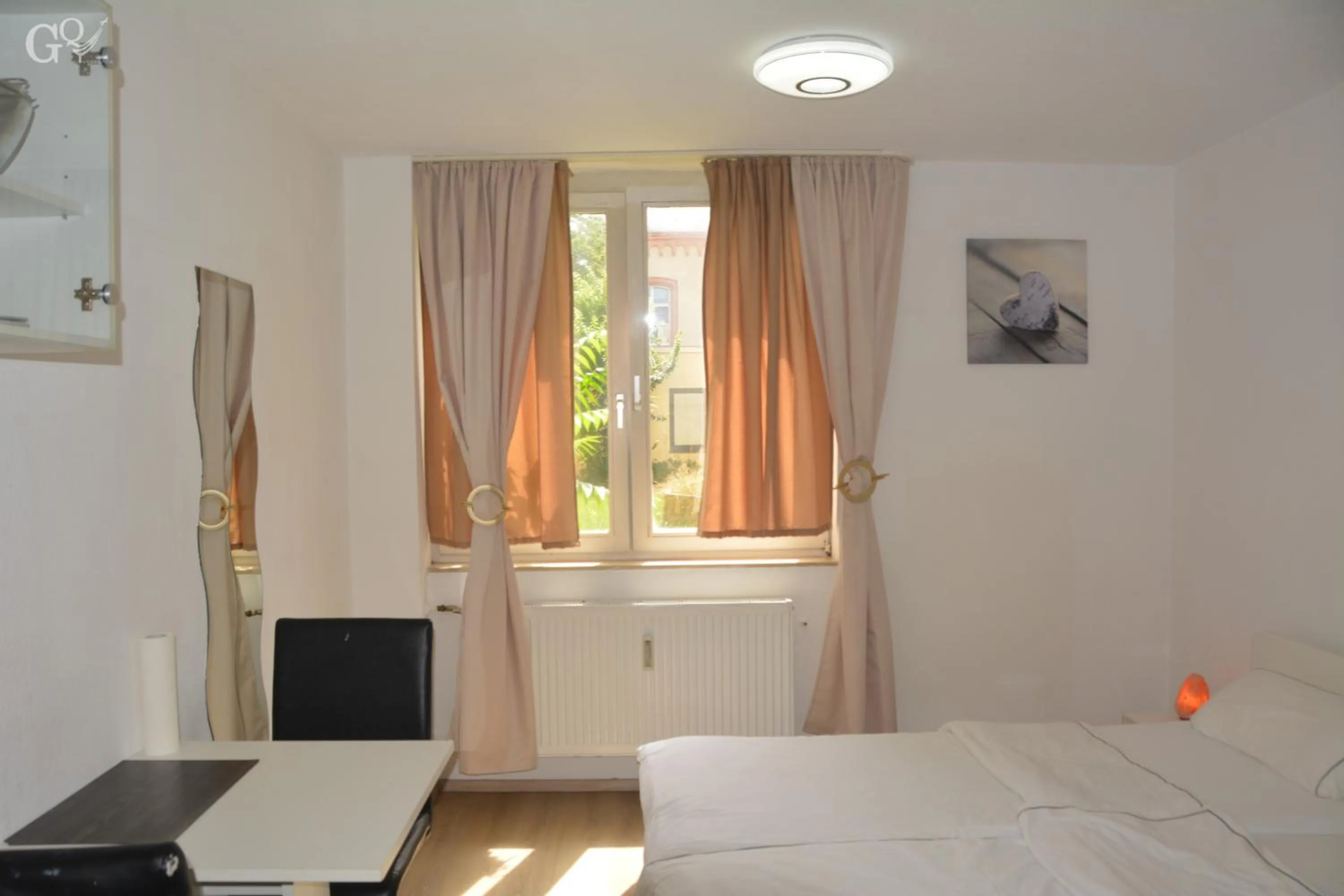 Photo of the whole room, Bed in Saarbrücken City Apartments