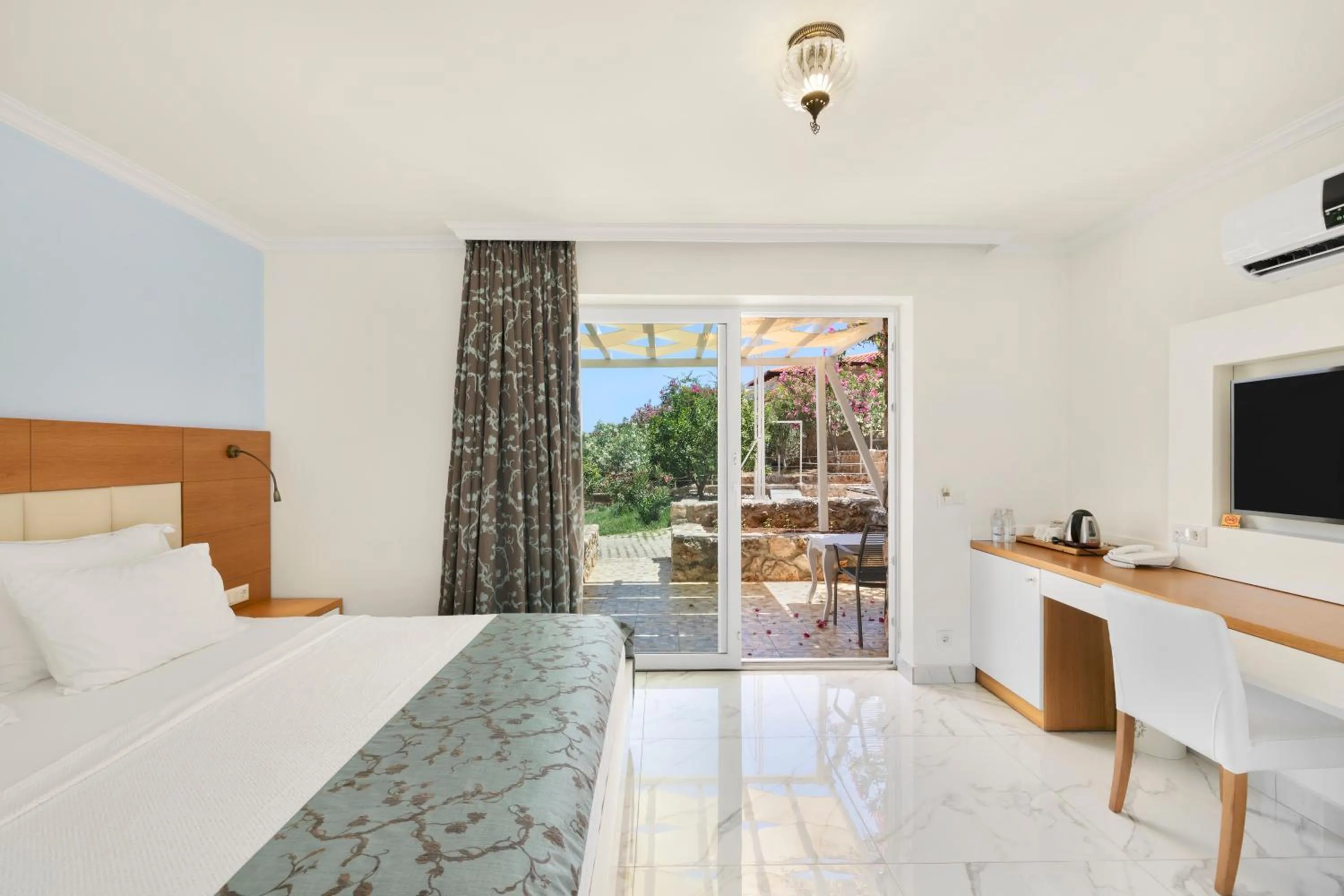 Bed in Blanca Beach Hotel