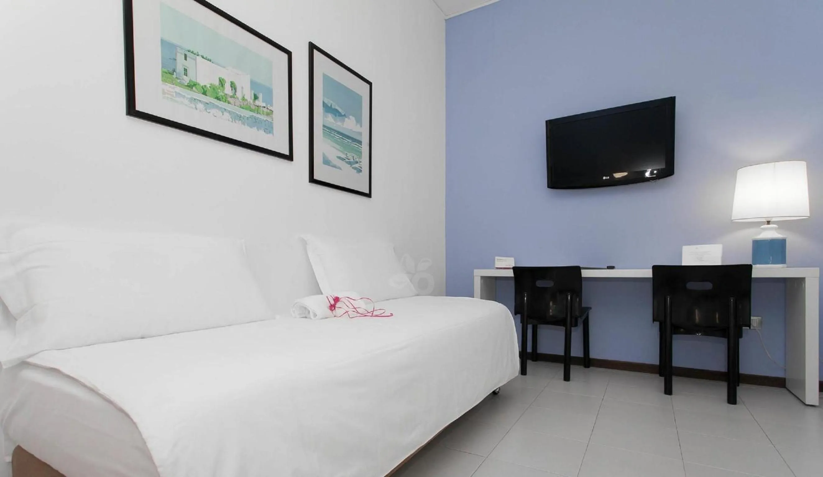 Bed, TV/Entertainment Center in Hotel Zenit Salento