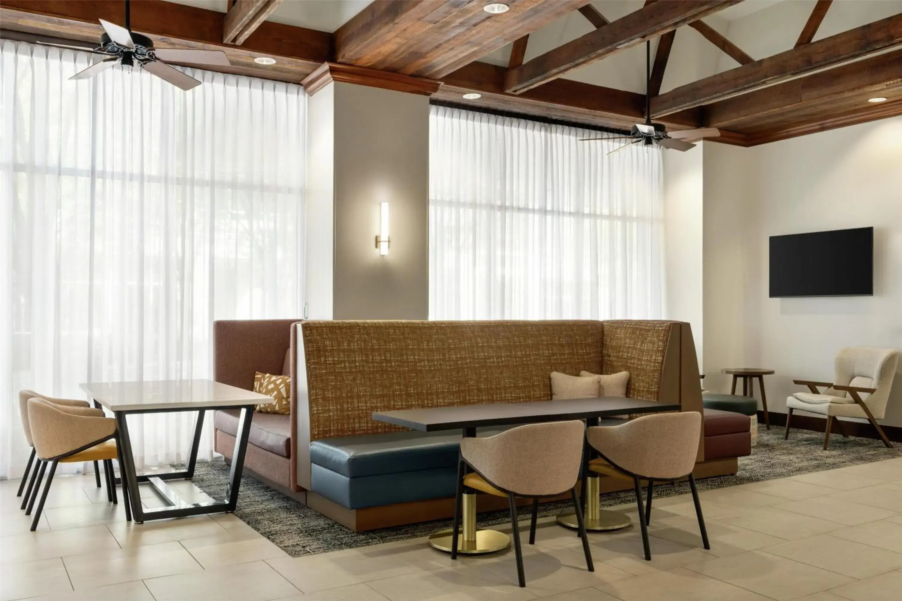 Lobby or reception in Hampton Inn & Suites Greenville-Downtown-Riverplace Lobby or reception in Hampton Inn & Suites Greenville-Downtown-Riverplace