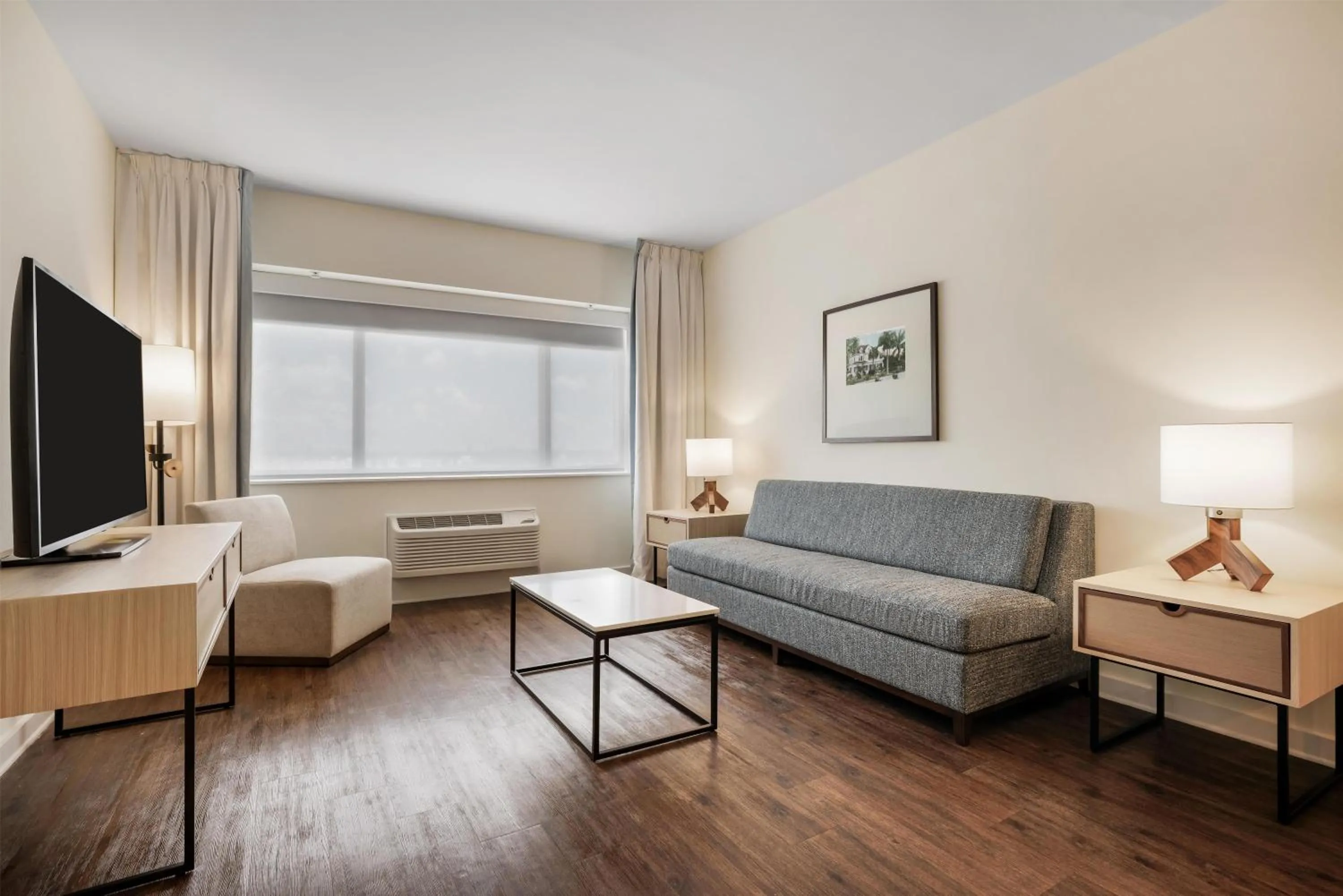 Living room in The Banyan Hotel Fort Myers, Tapestry Collection by Hilton