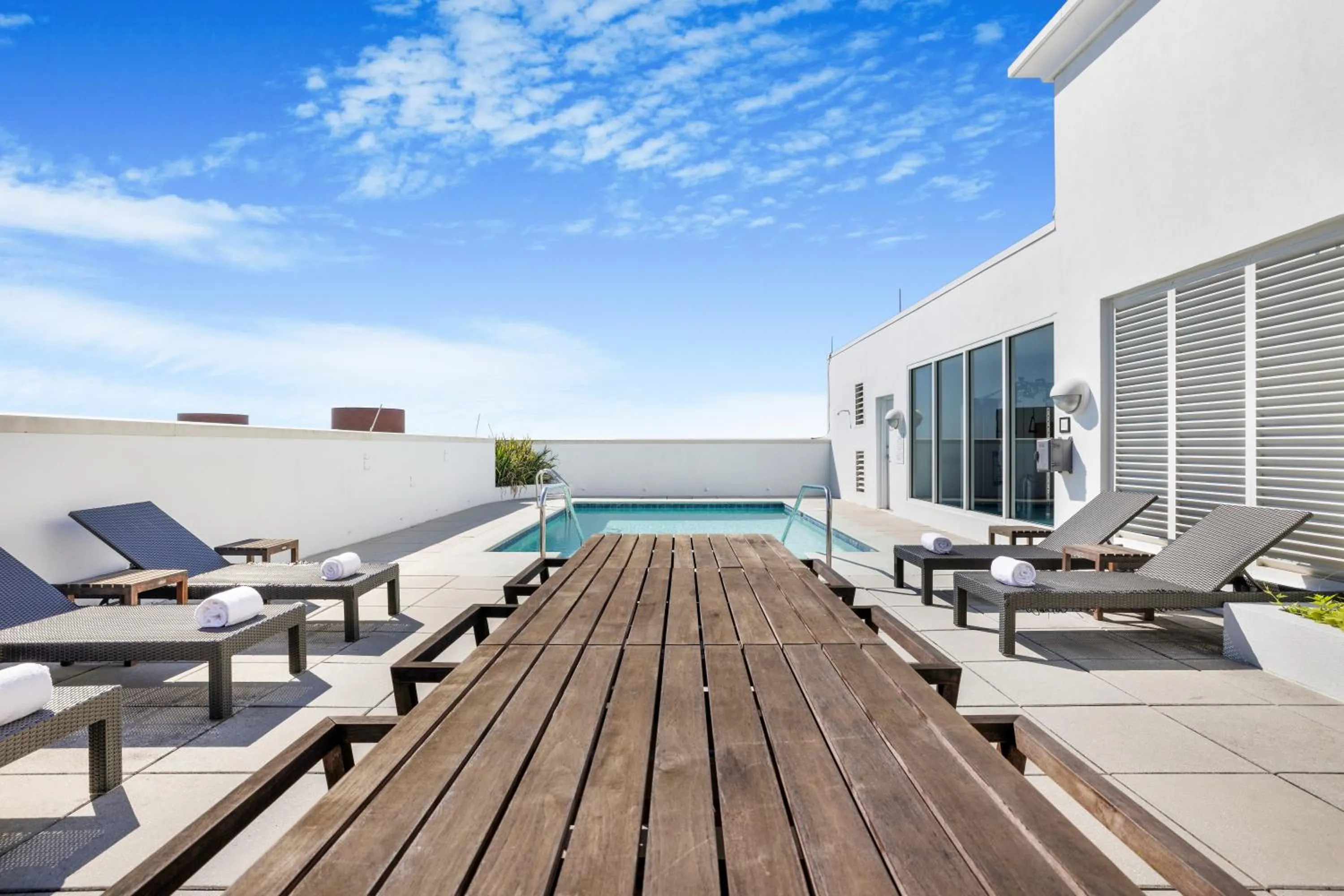 Swimming pool in The Banyan Hotel Fort Myers, Tapestry Collection by Hilton