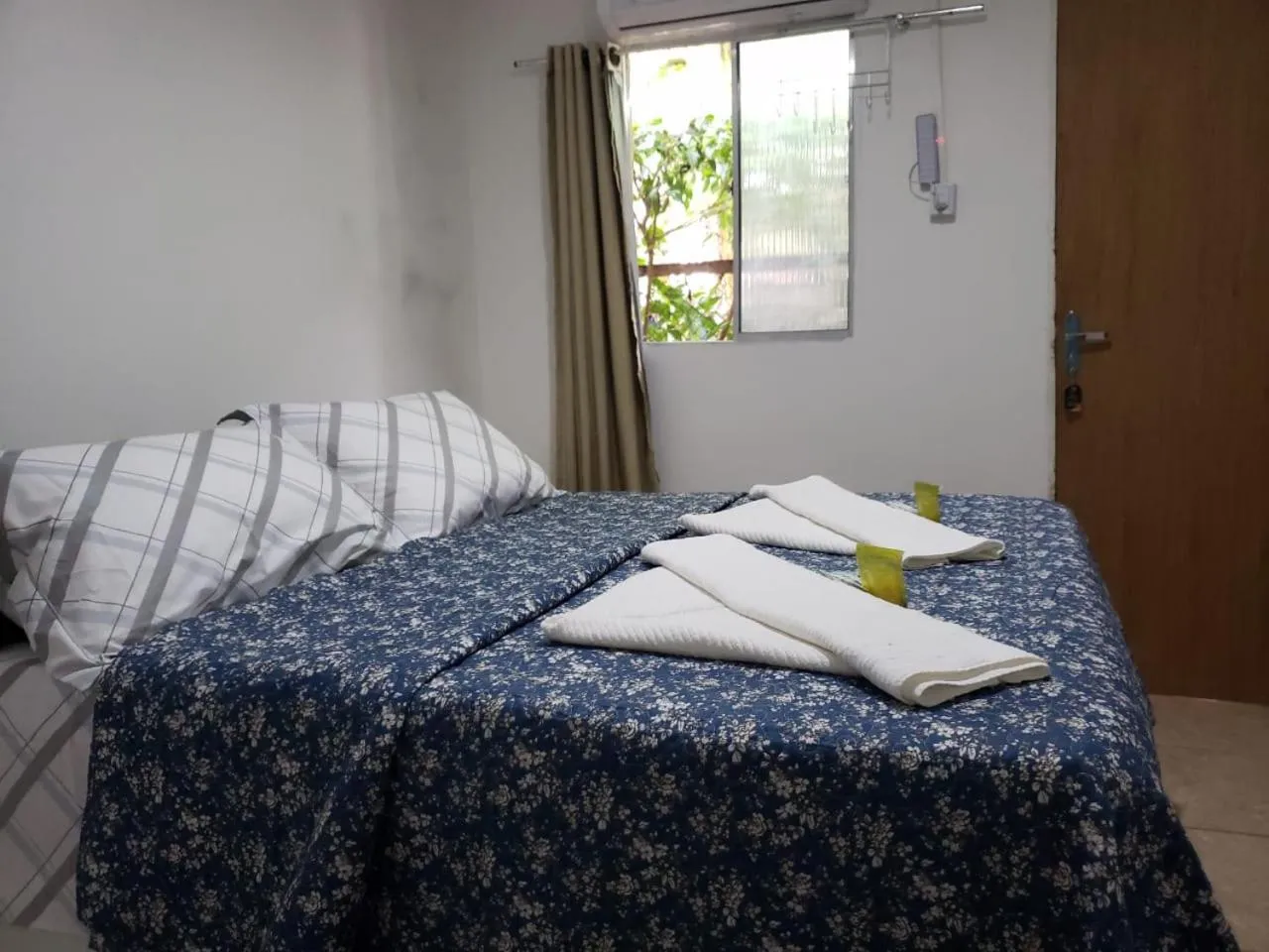 Bed in Pousada Martins e Cia