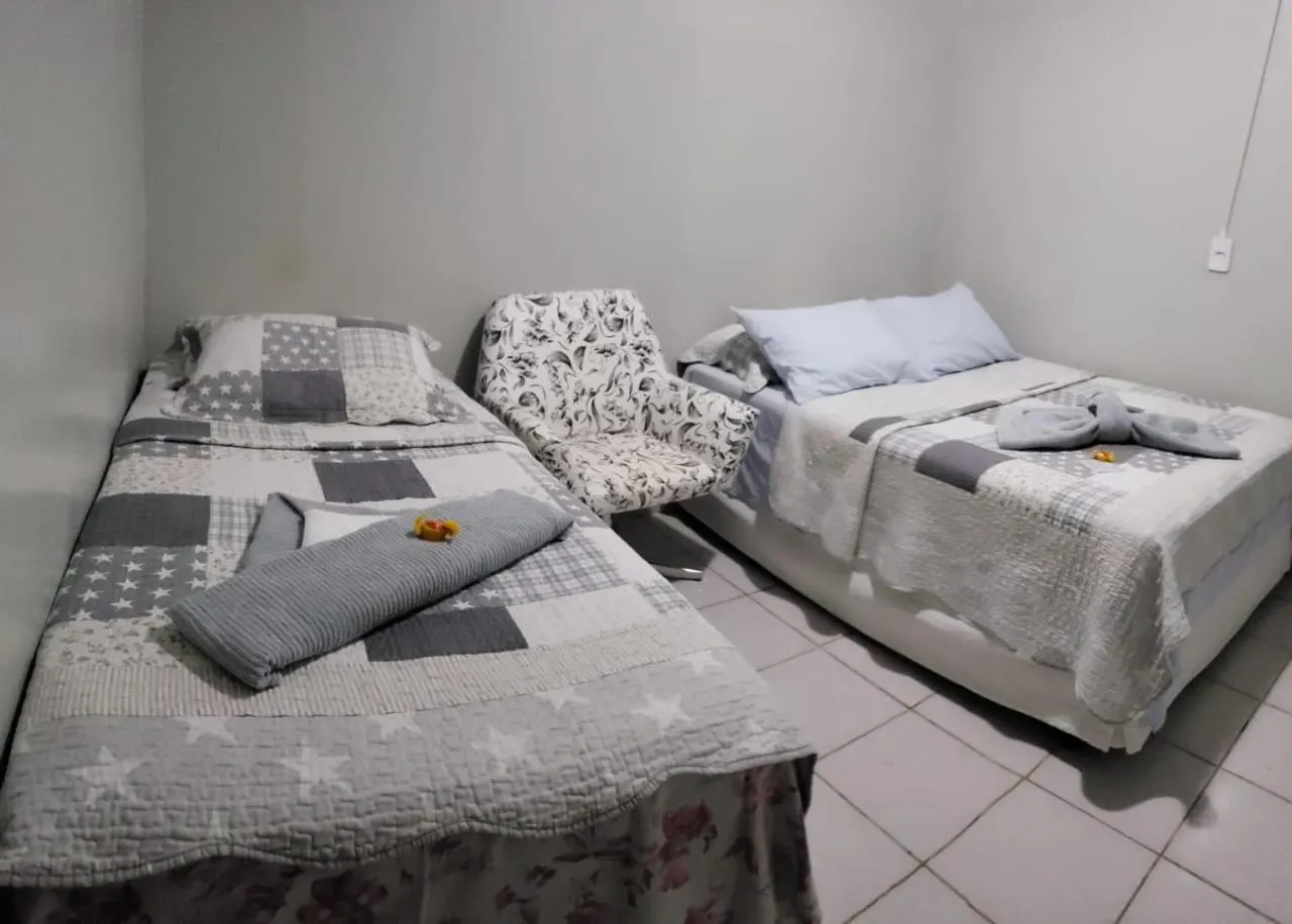 Photo of the whole room, Bed in Pousada Martins e Cia