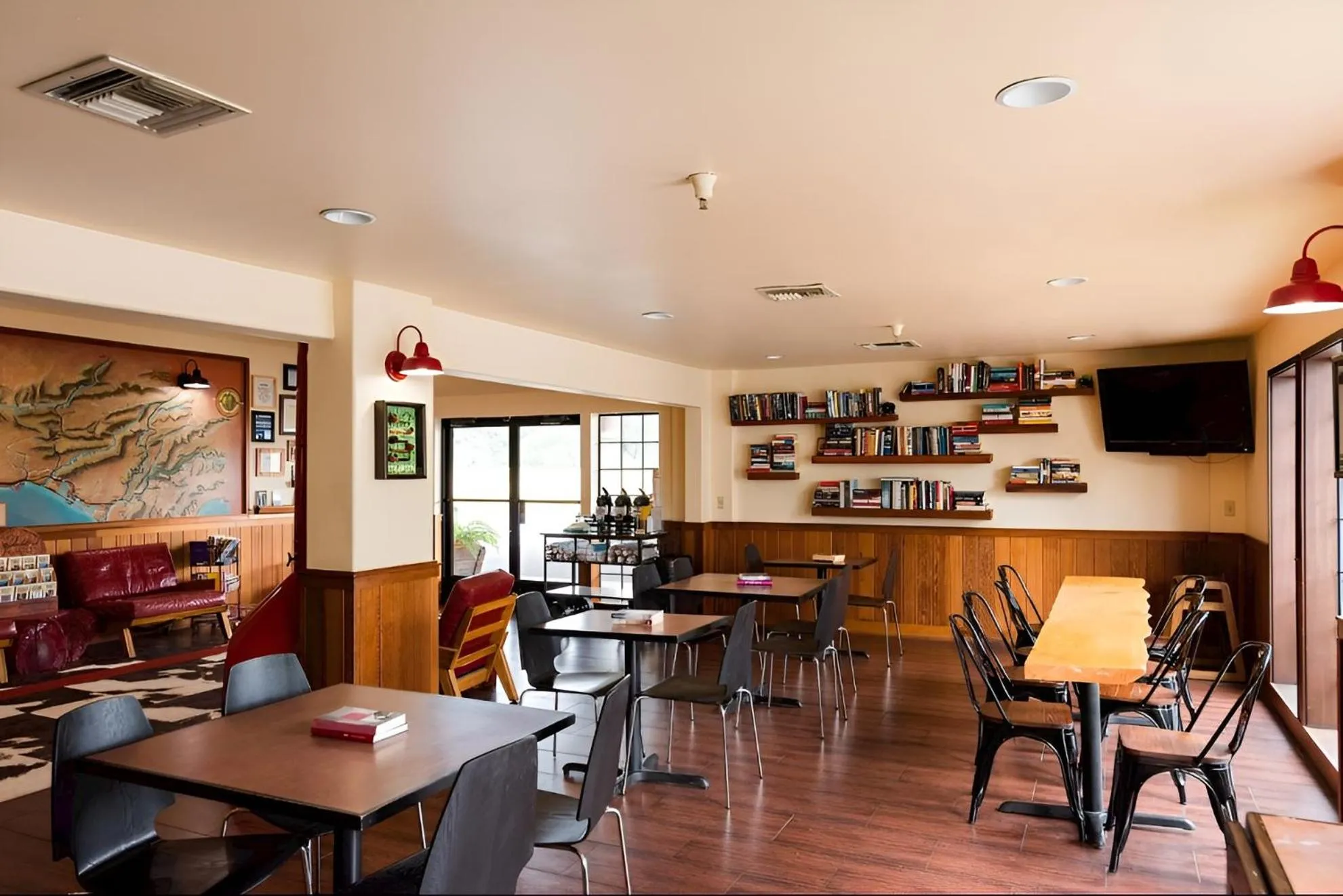 Communal lounge/ TV room in The Redwood Riverwalk, a boutique hotel