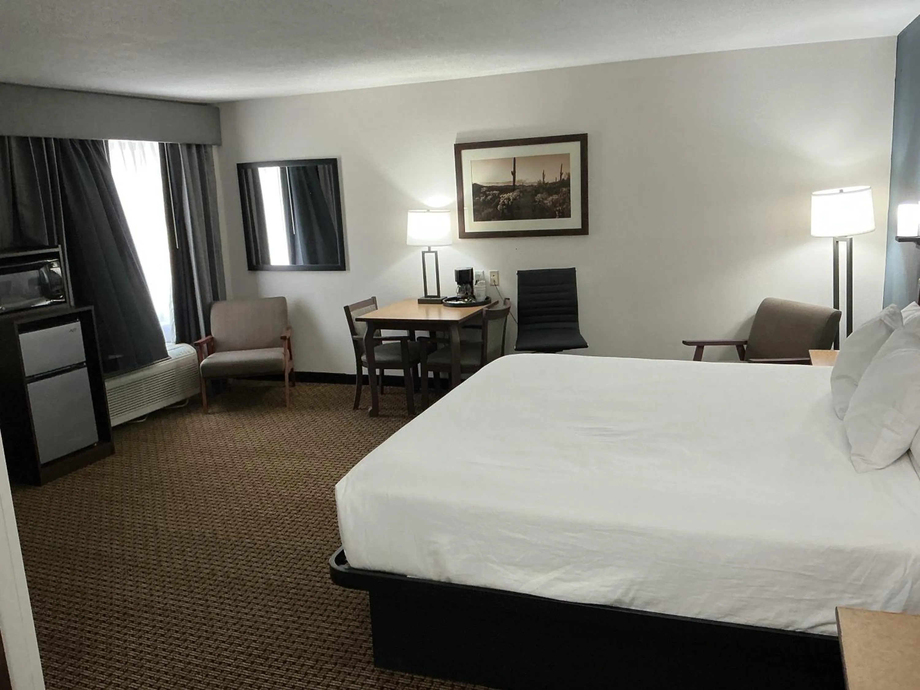 Bed in Tombstone Grand Hotel, a Baymont by Wyndham