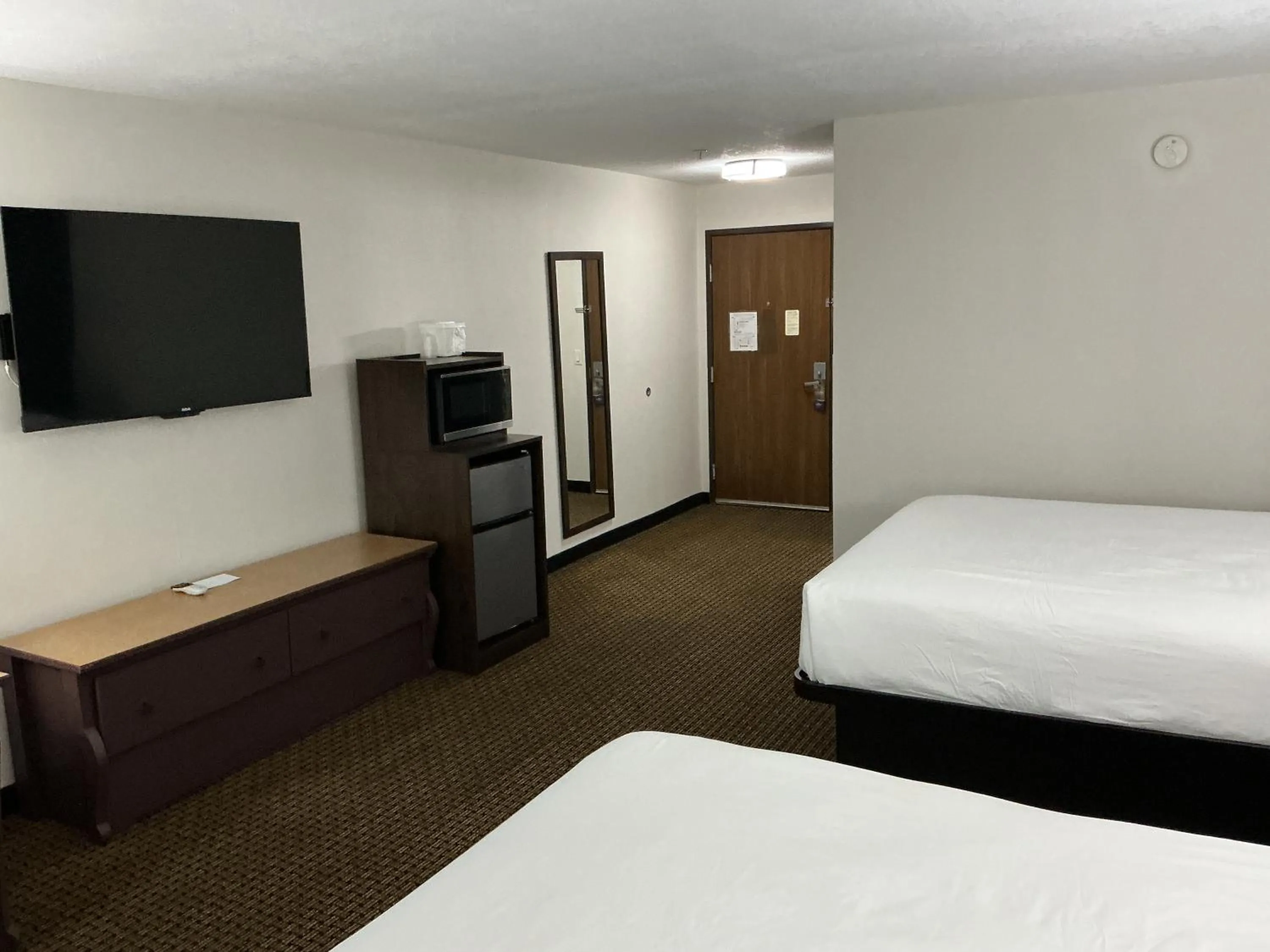 Bed in Tombstone Grand Hotel, a Baymont by Wyndham